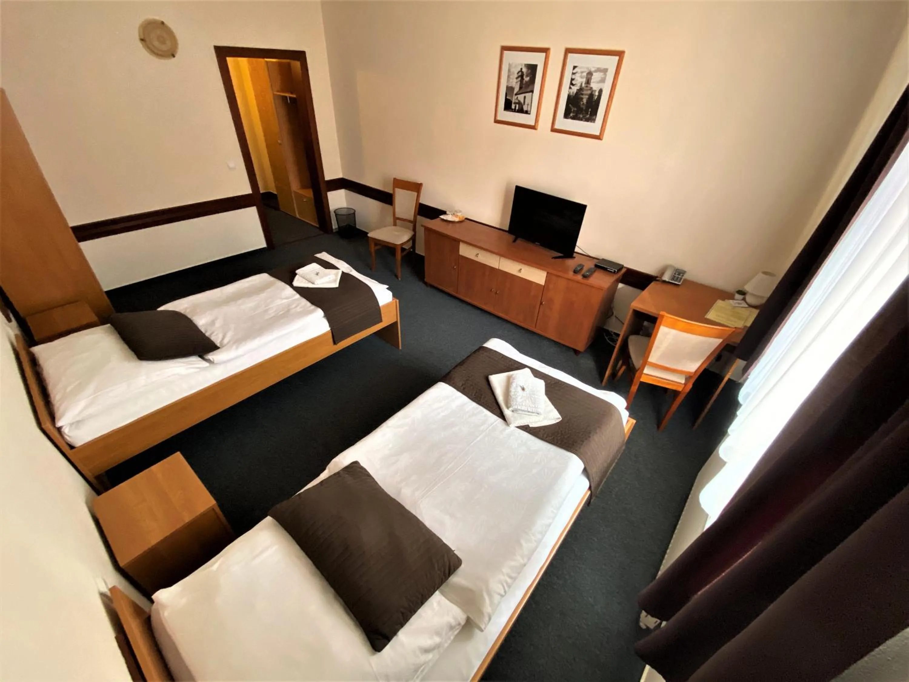 Bed in Garni Hotel Tatramonti