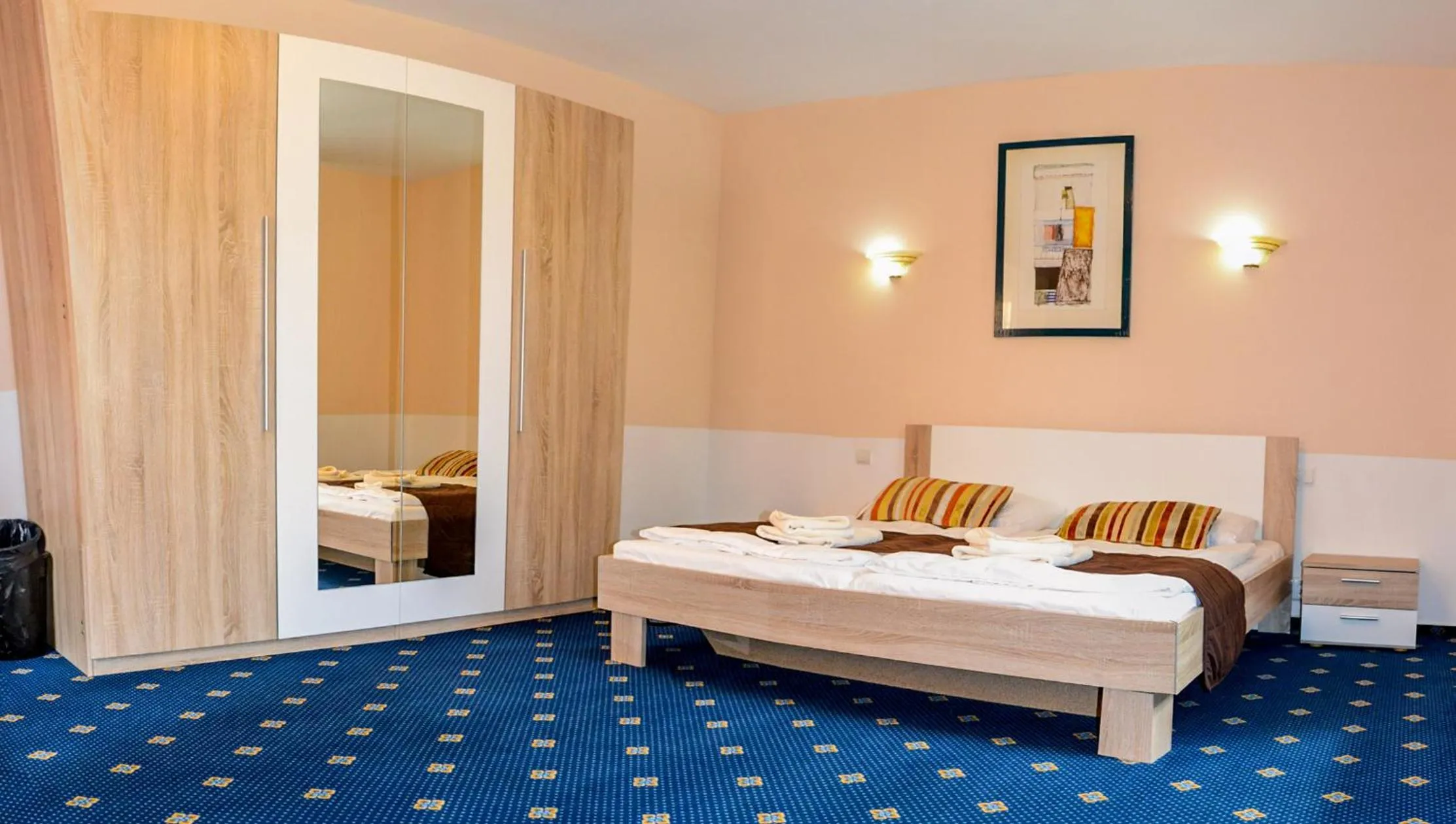 Bed in Garni Hotel Tatramonti