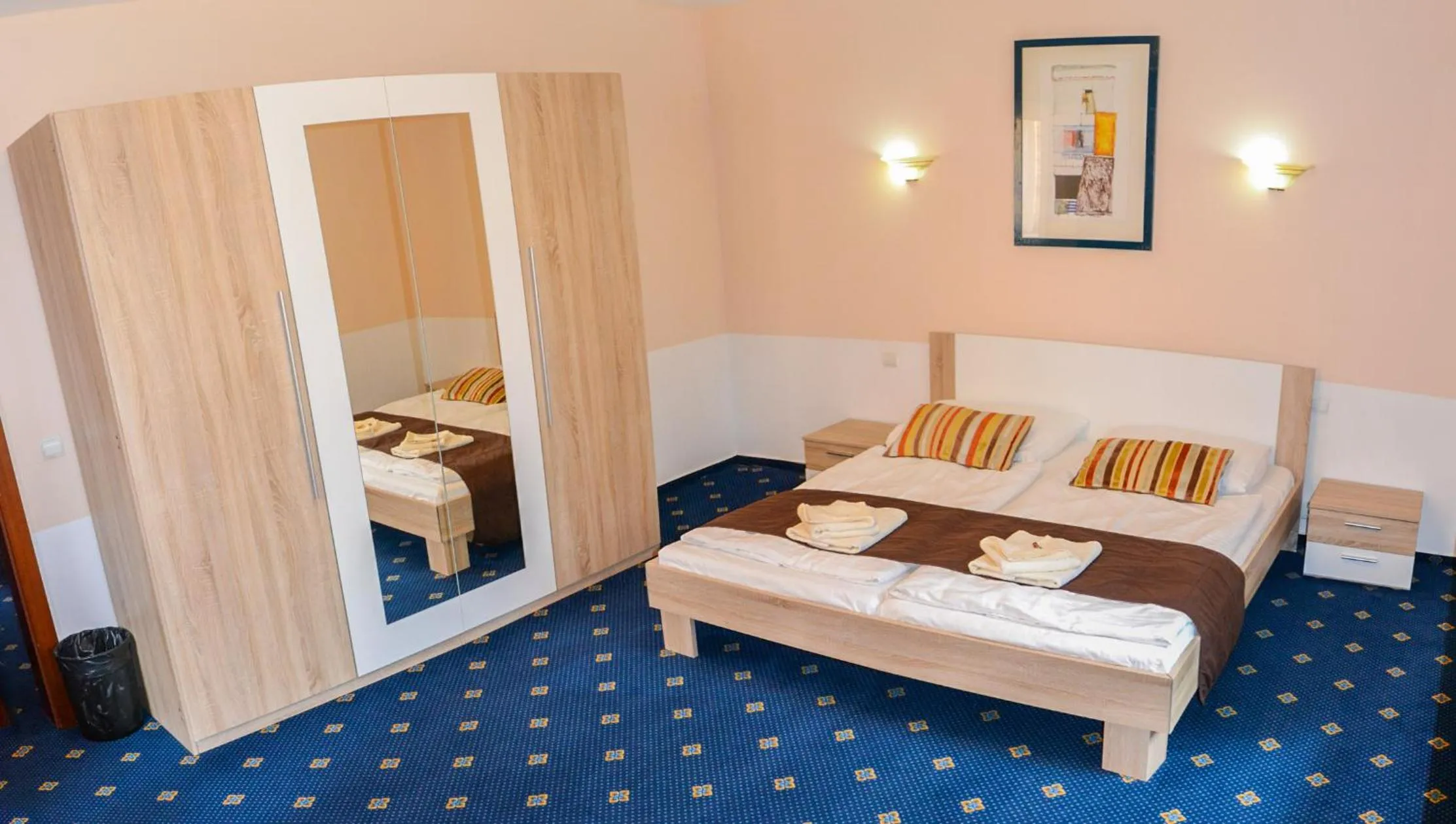 Bed in Garni Hotel Tatramonti