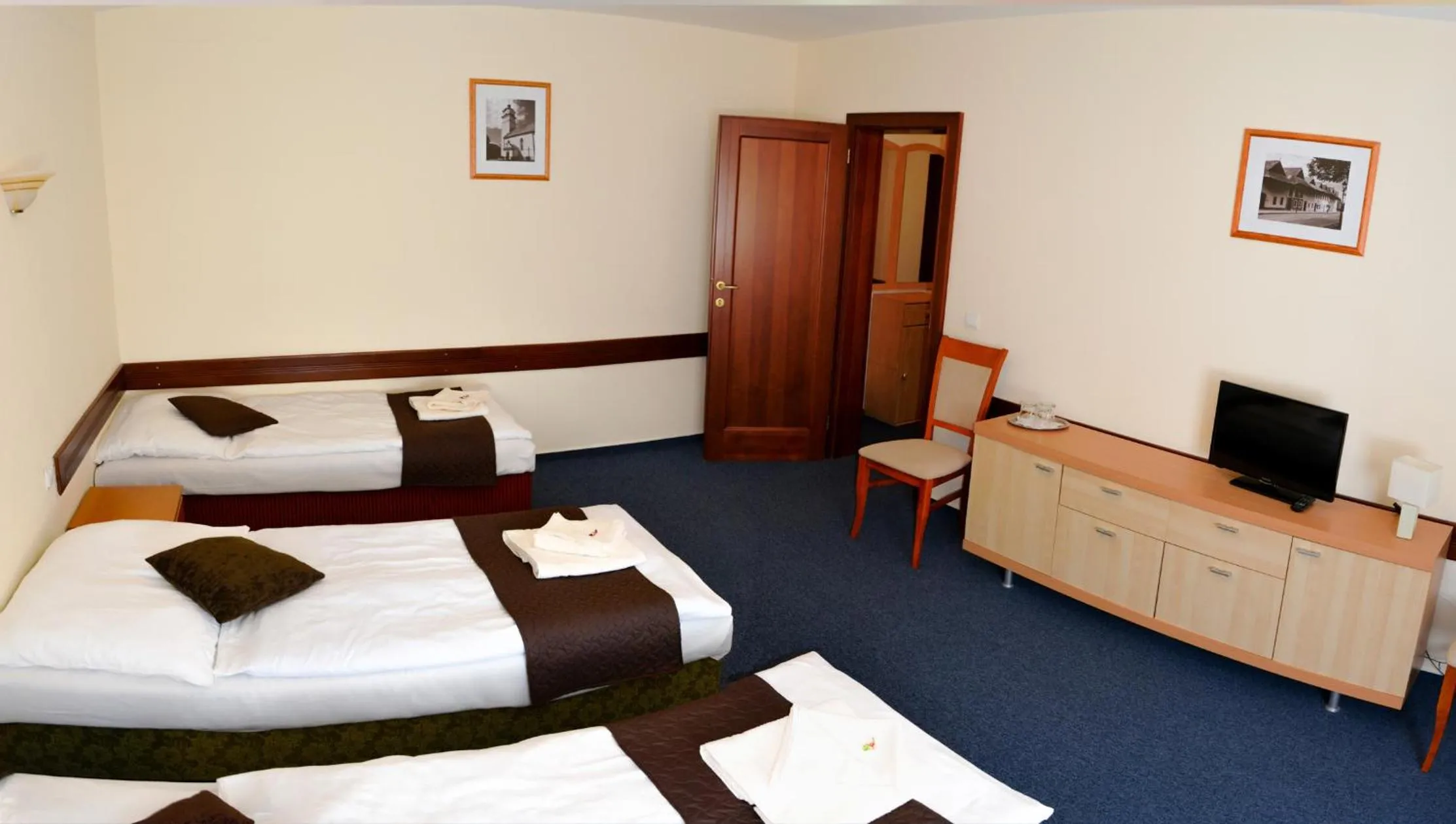 Bed in Garni Hotel Tatramonti