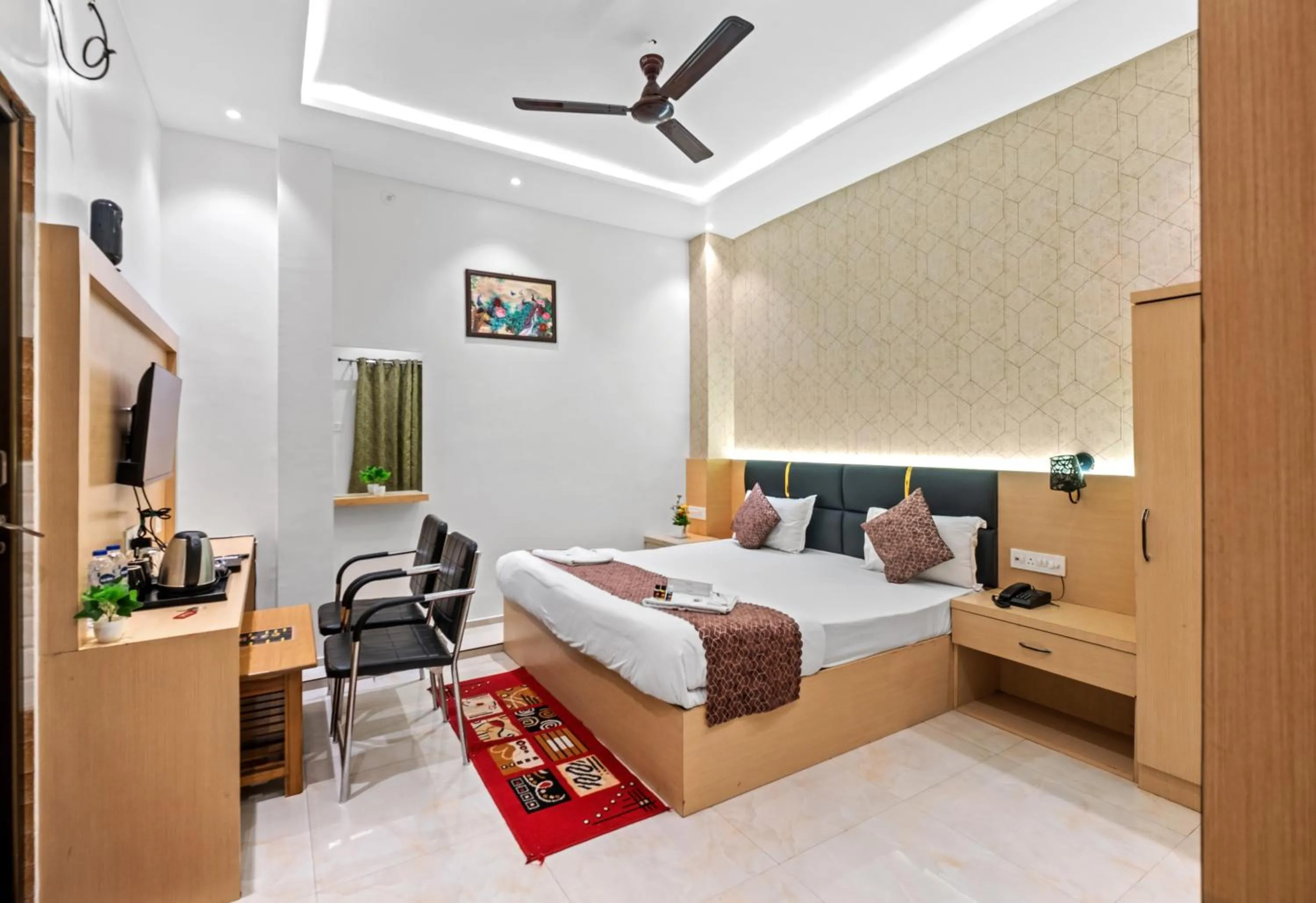 Bed in Hotel Ramay Palace
