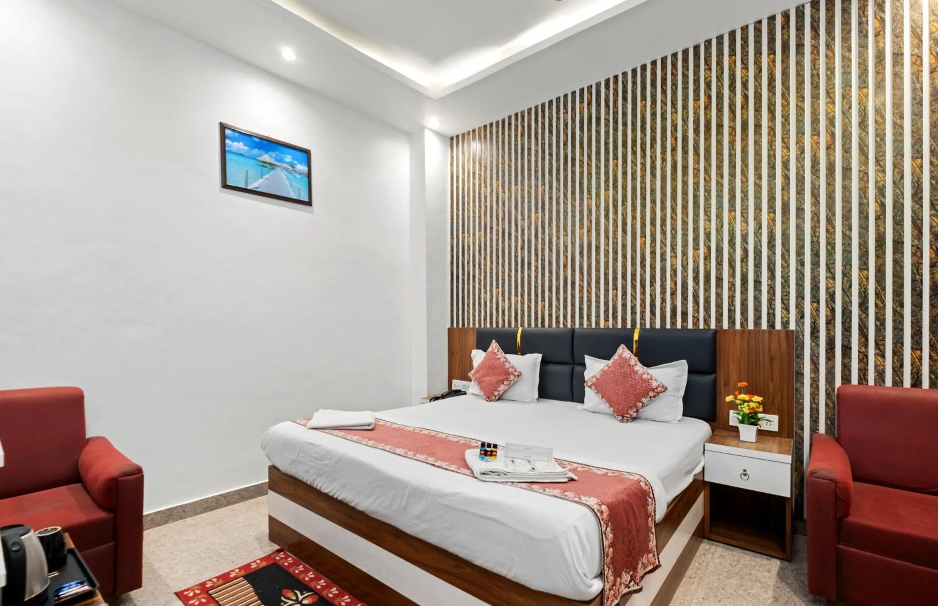 Bed in Hotel Ramay Palace