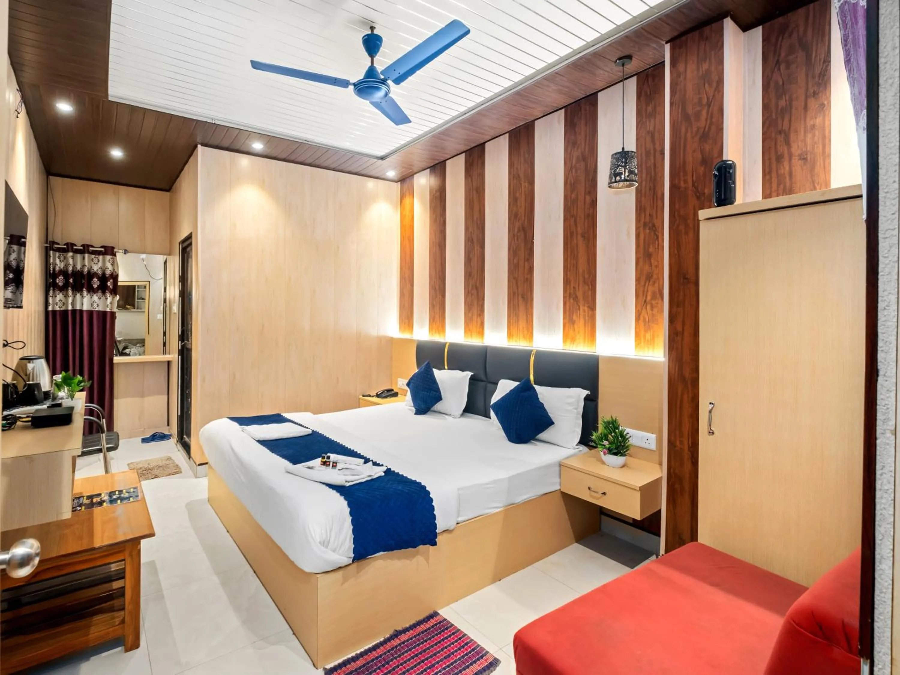 Bed in Hotel Ramay Palace