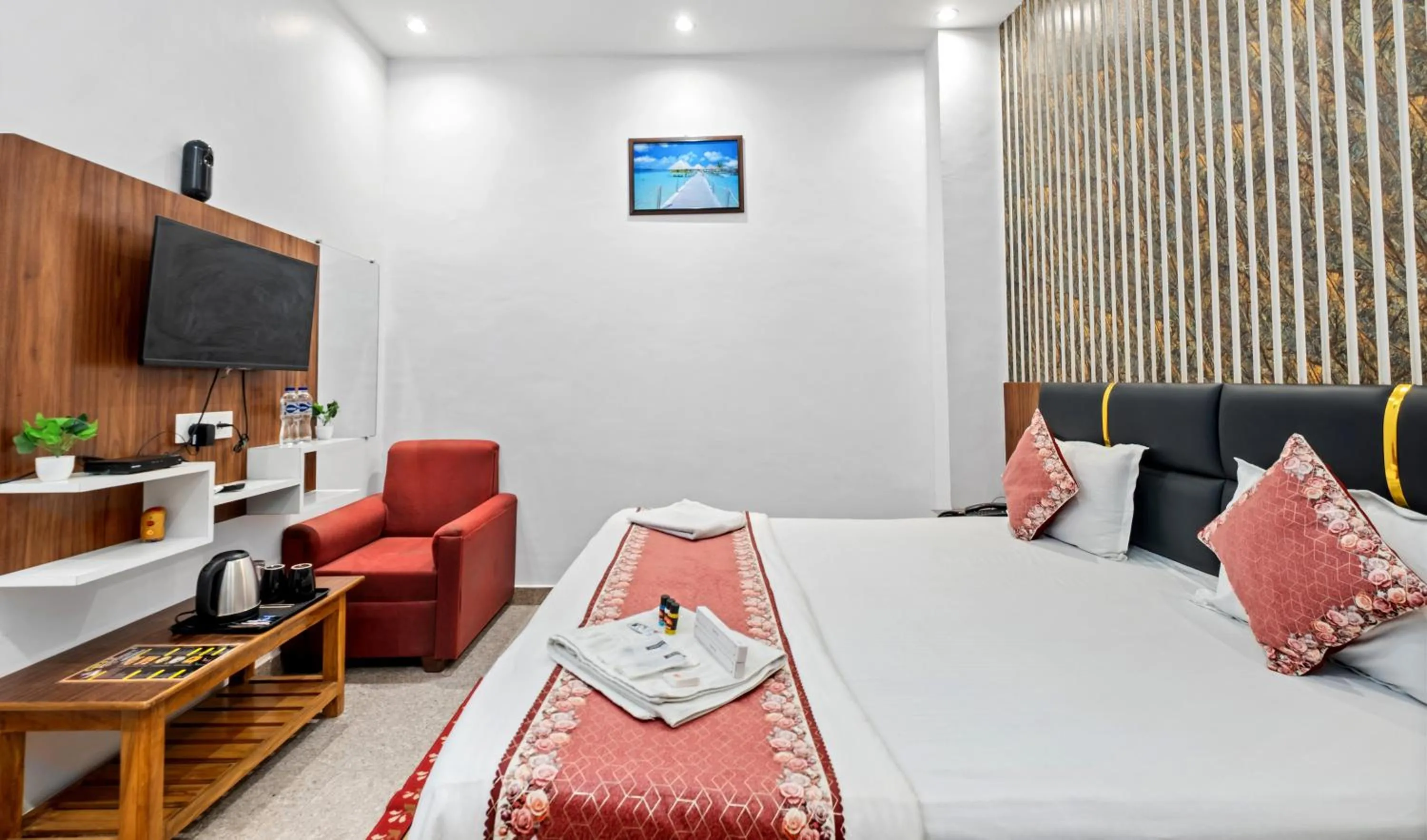 Bed in Hotel Ramay Palace