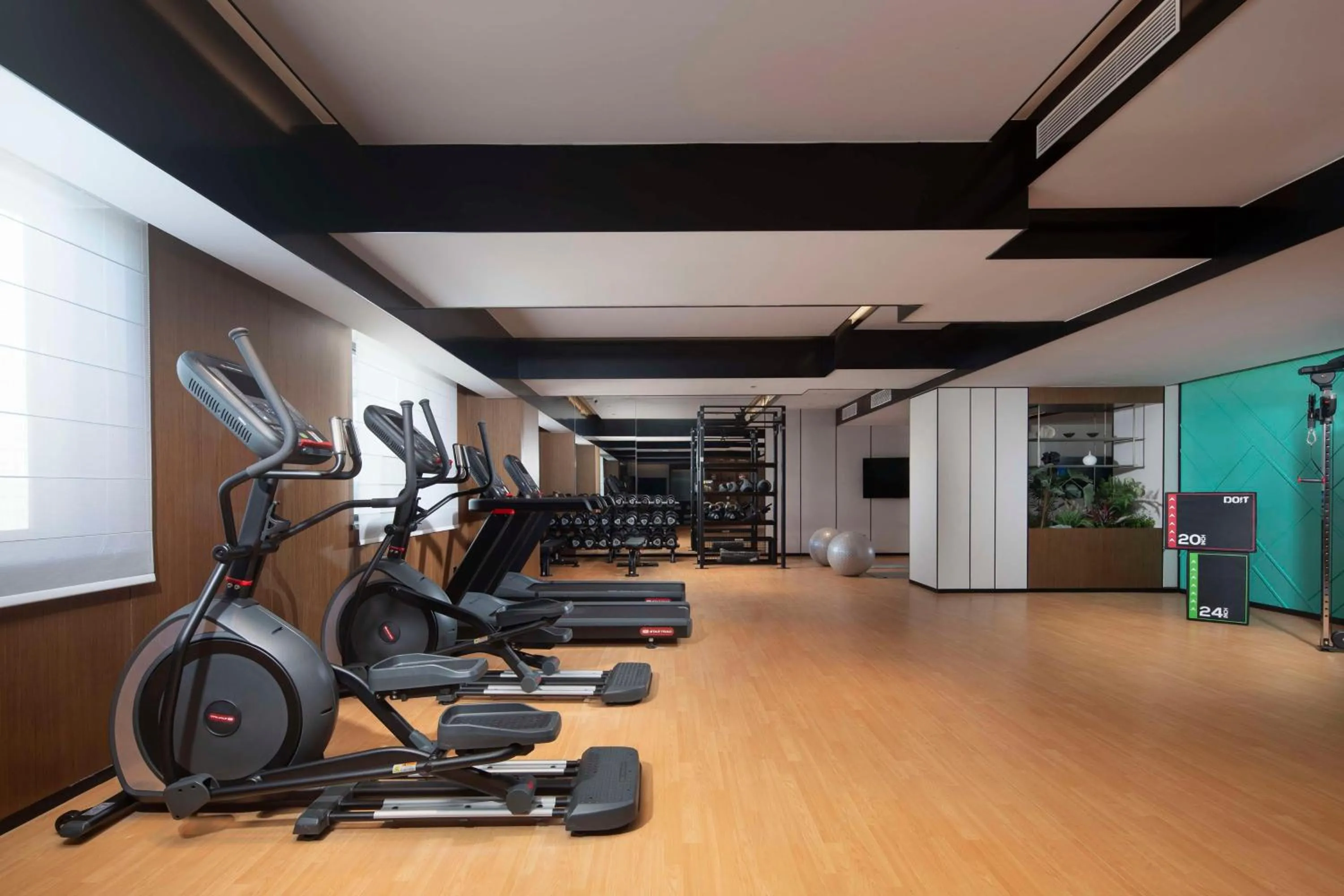 Fitness centre/facilities in Hilton Garden Inn Tianjin Five Great Avenues