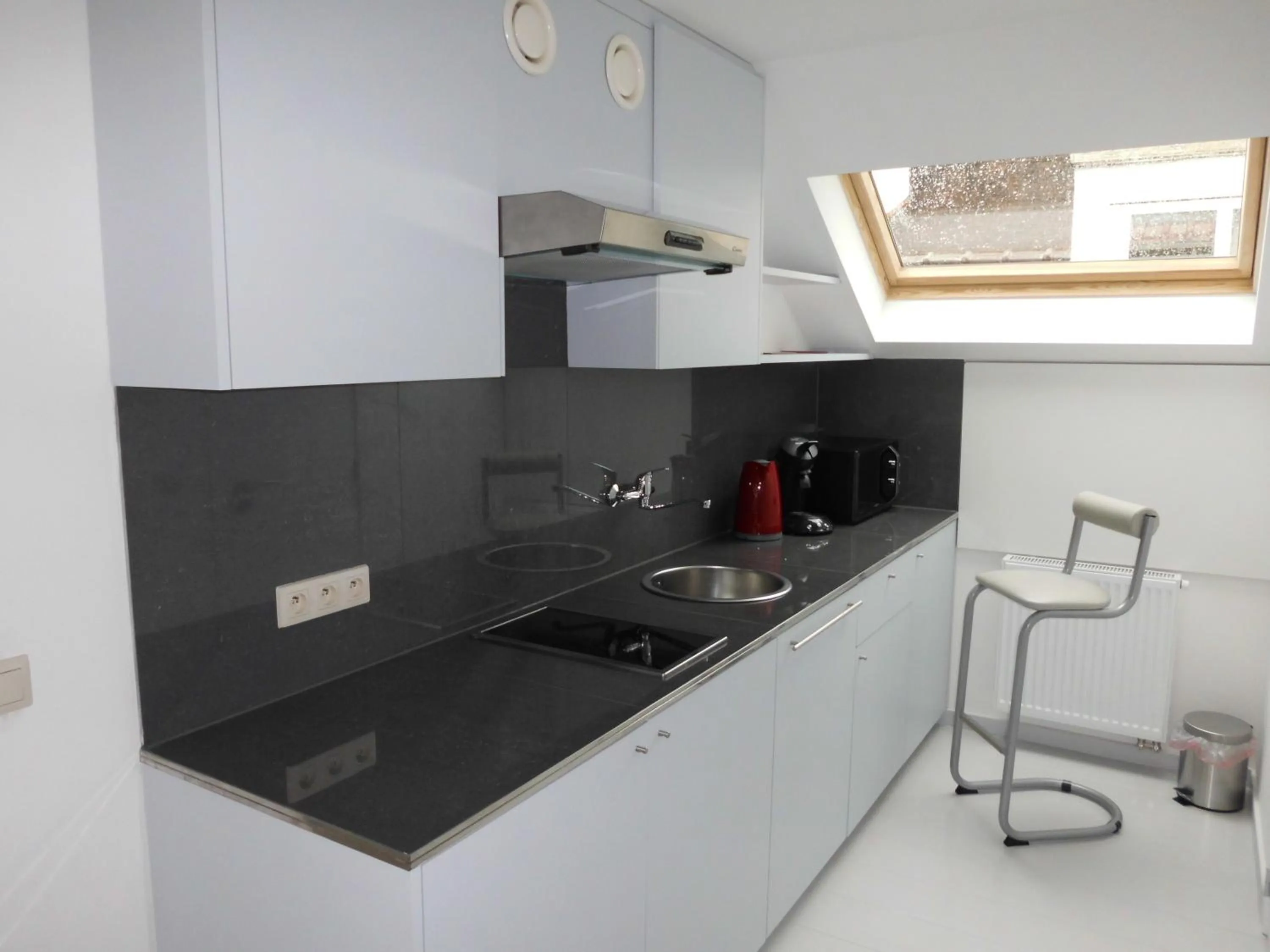 Kitchen or kitchenette in Aparthotel Midi Residence