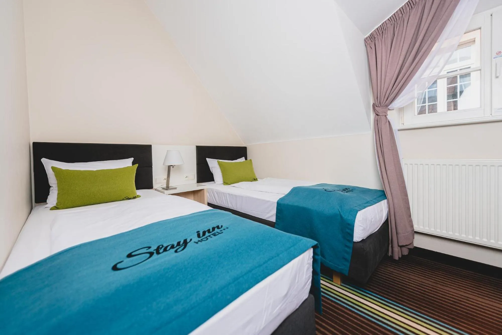 Bed in Stay inn Hotel Gdańsk