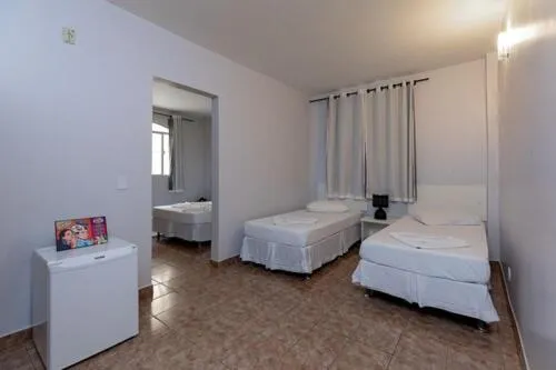 Bed in Iguassu Flats Hotel