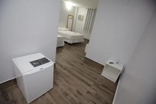 Bed in Iguassu Flats Hotel