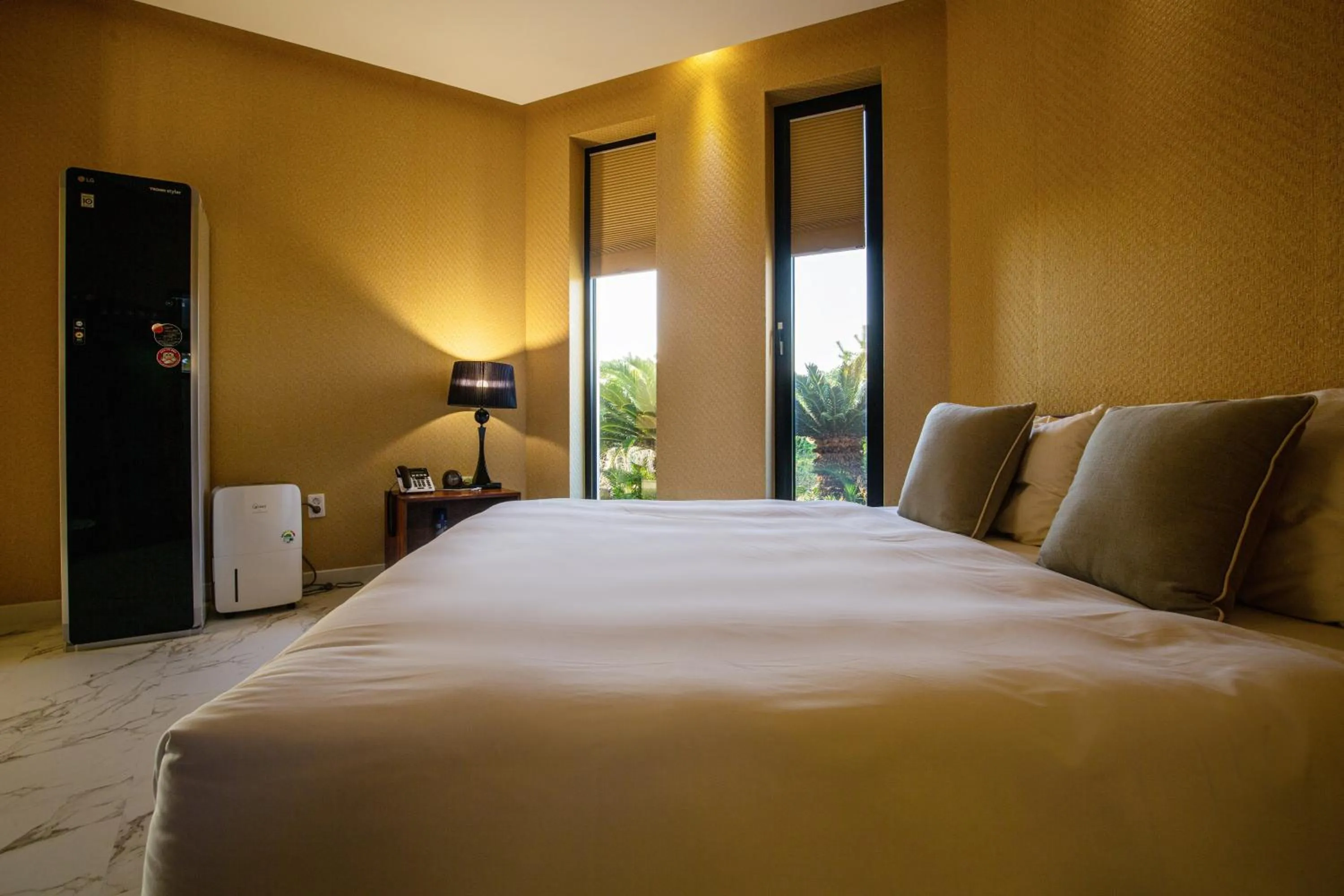 Bed in Libentia Hotel & Poolvilla