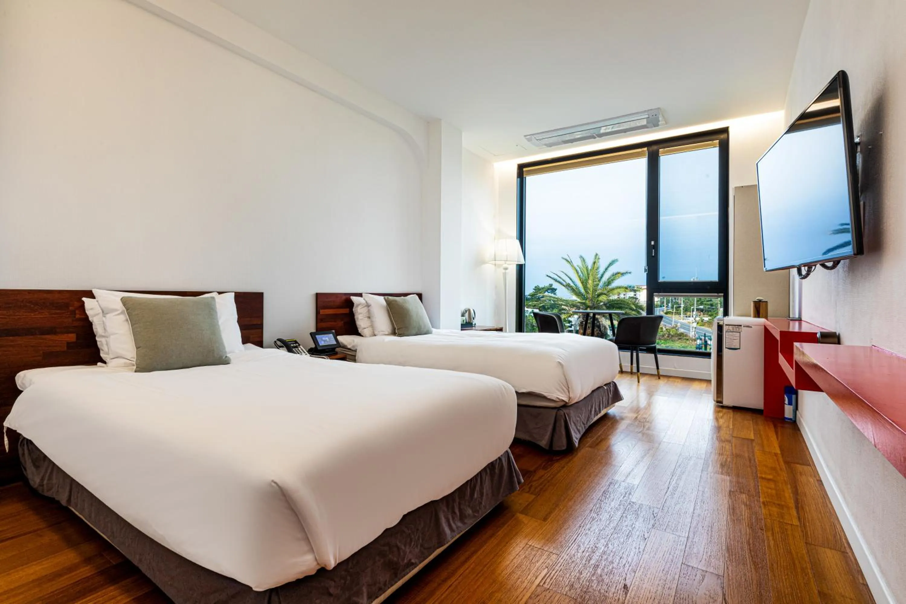 Bed in Libentia Hotel & Poolvilla
