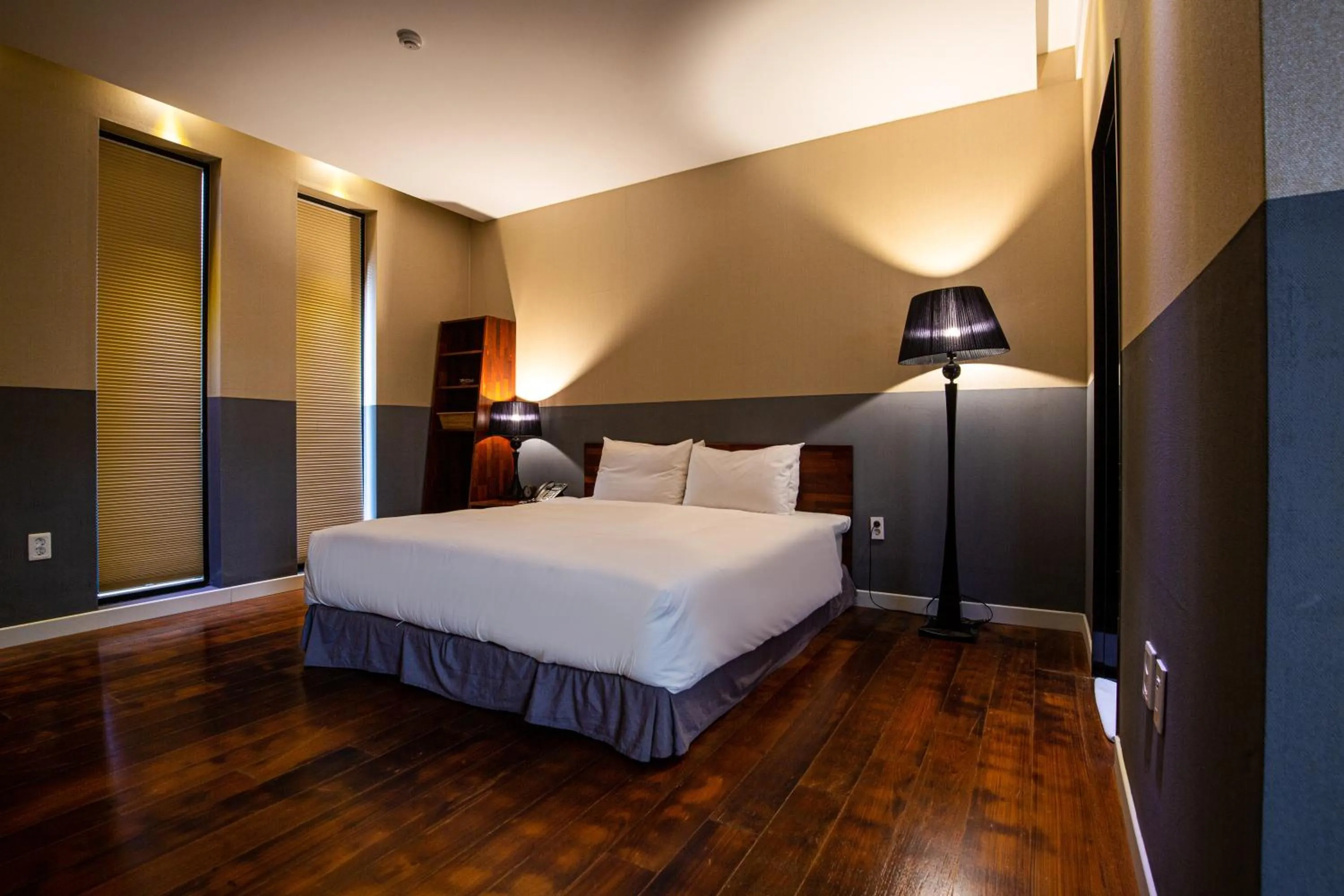 Bed in Libentia Hotel & Poolvilla