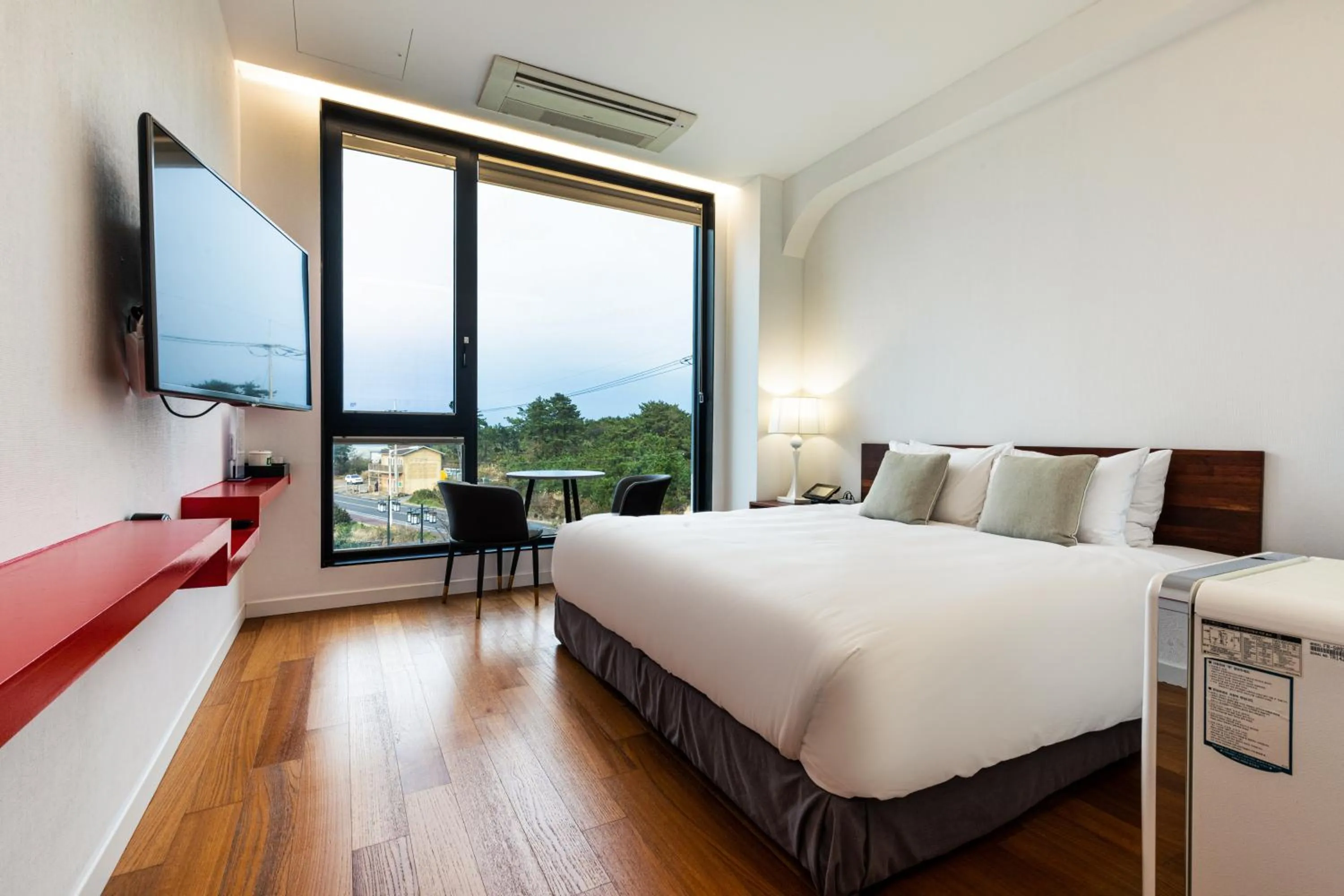 Bed in Libentia Hotel & Poolvilla