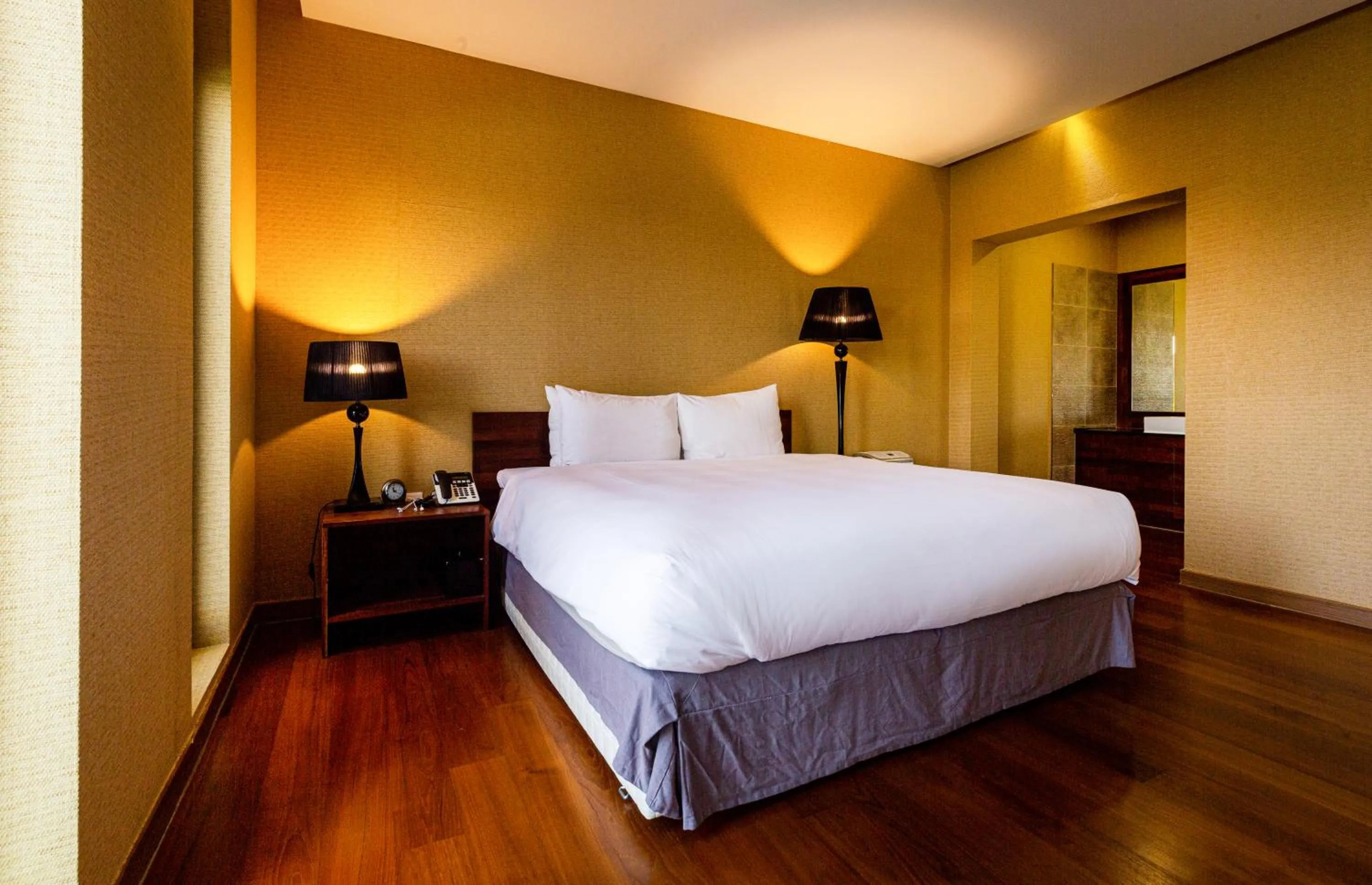 Bed in Libentia Hotel & Poolvilla