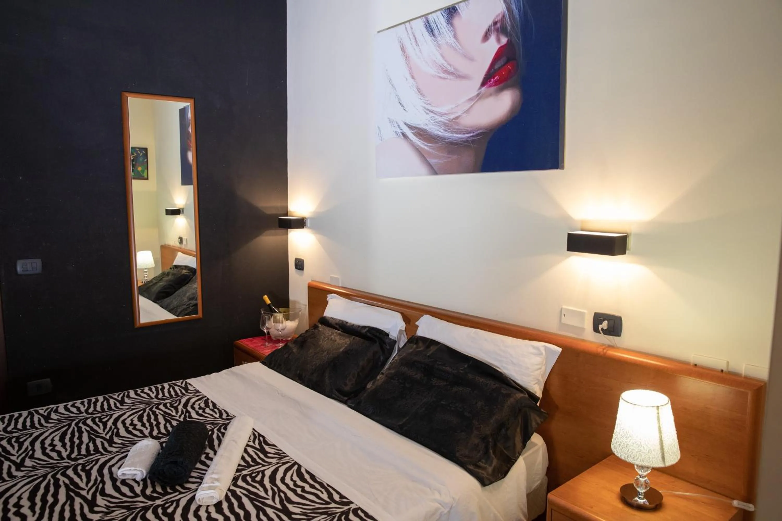 Bedroom in Hotel Merlino