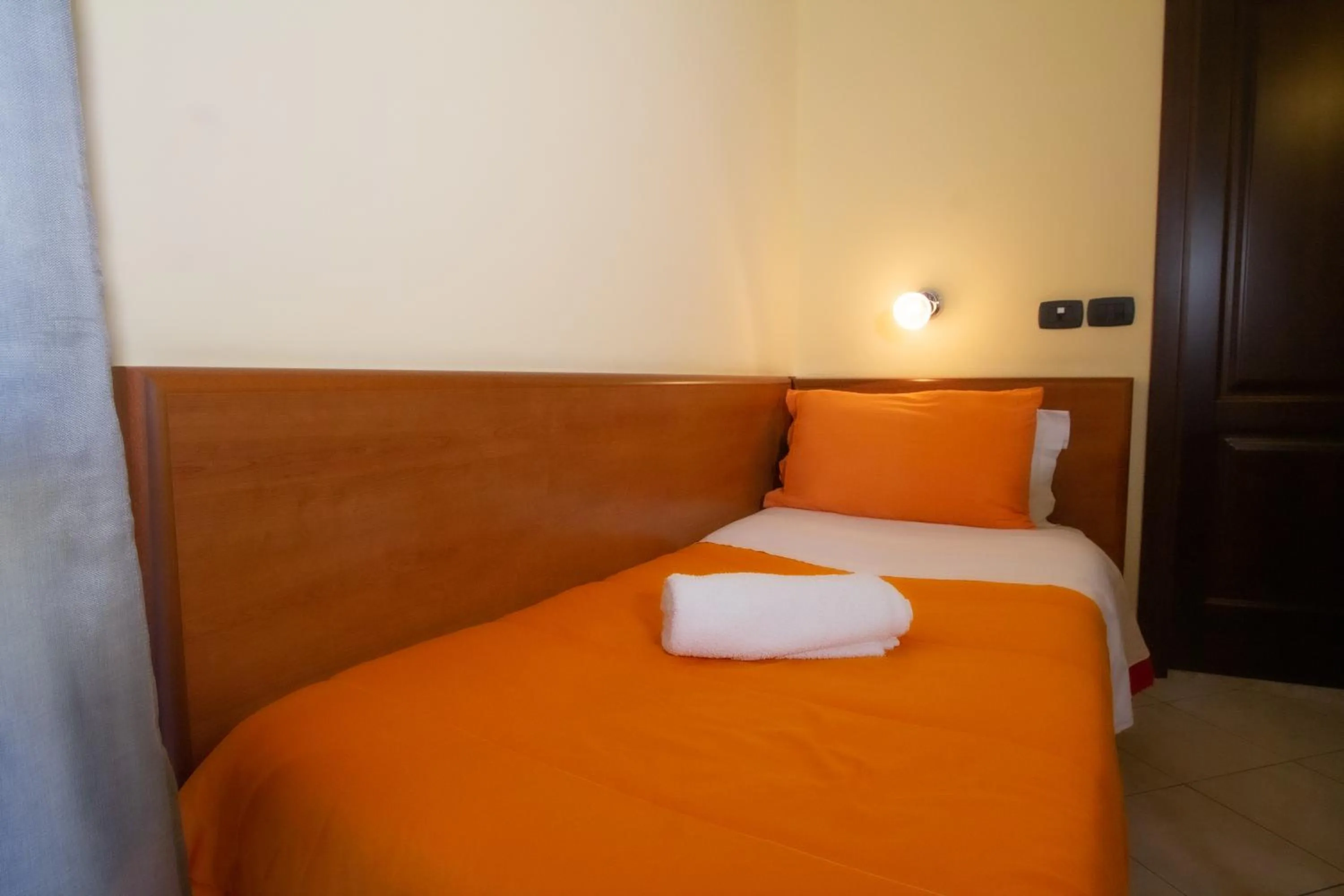 Bedroom in Hotel Merlino