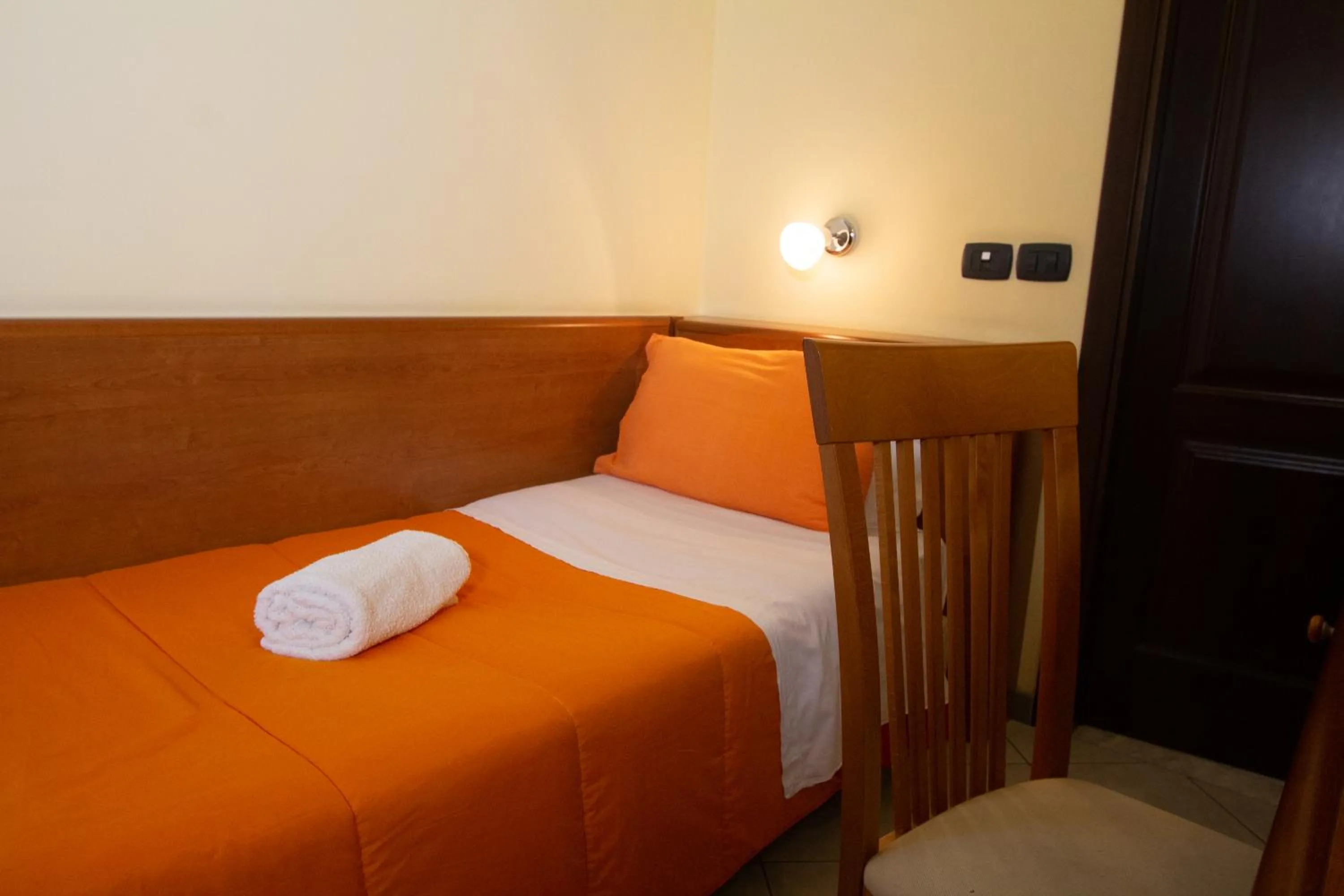 Bedroom in Hotel Merlino