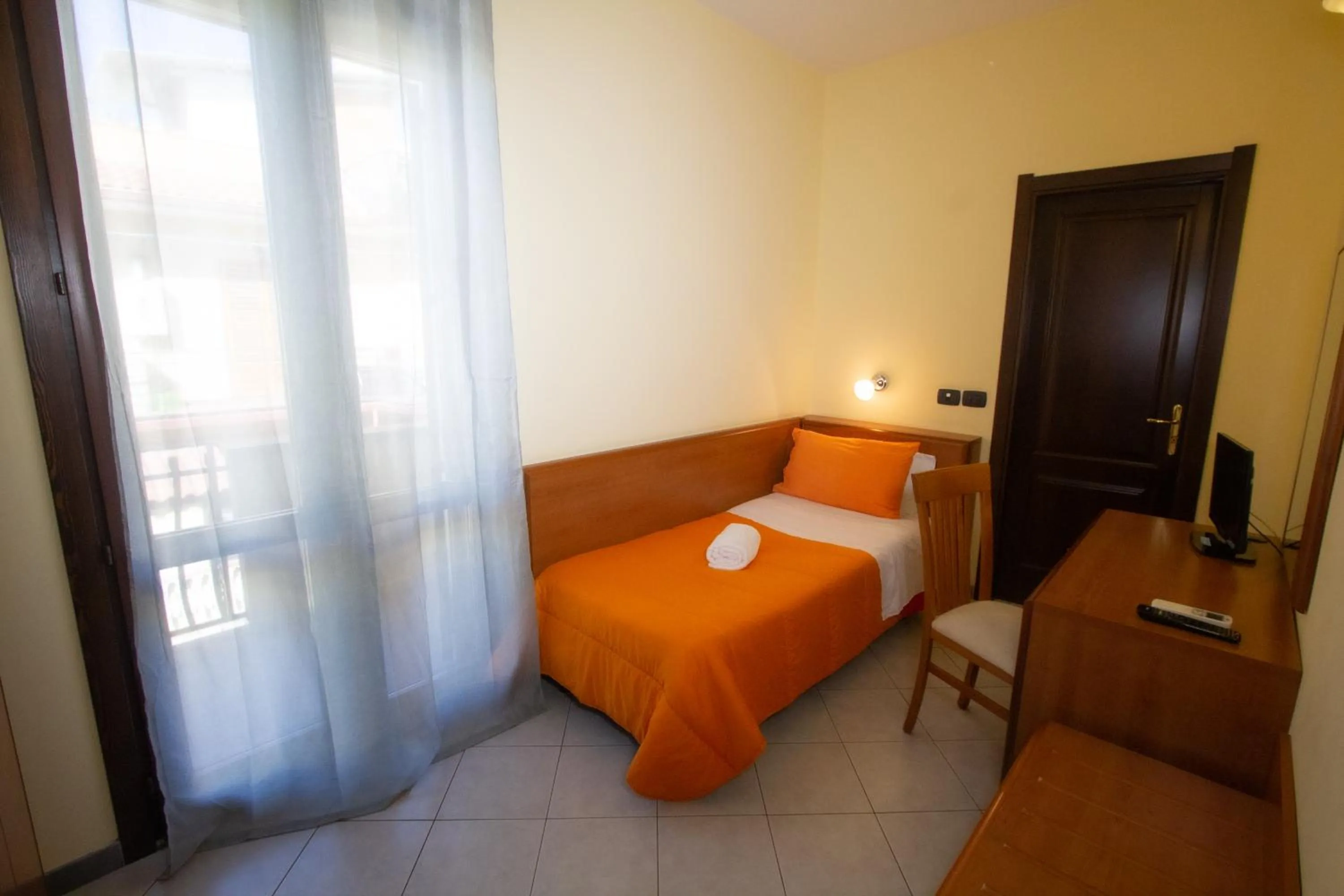 Bedroom in Hotel Merlino