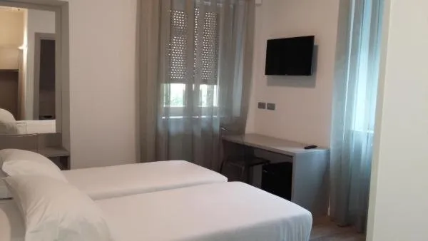 Bed in Hotel Quarcino