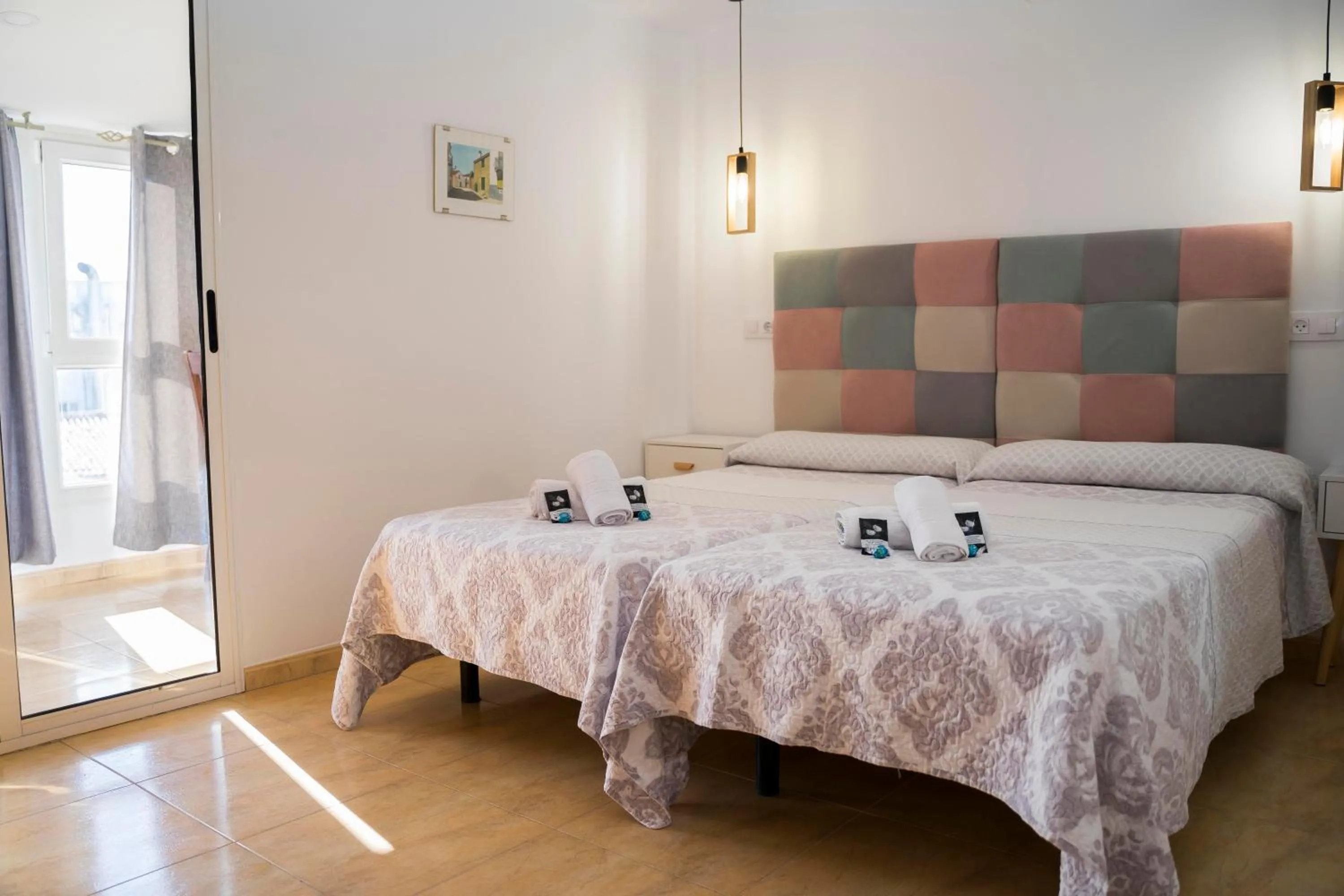 Bed in Hostal Goyesco Plaza