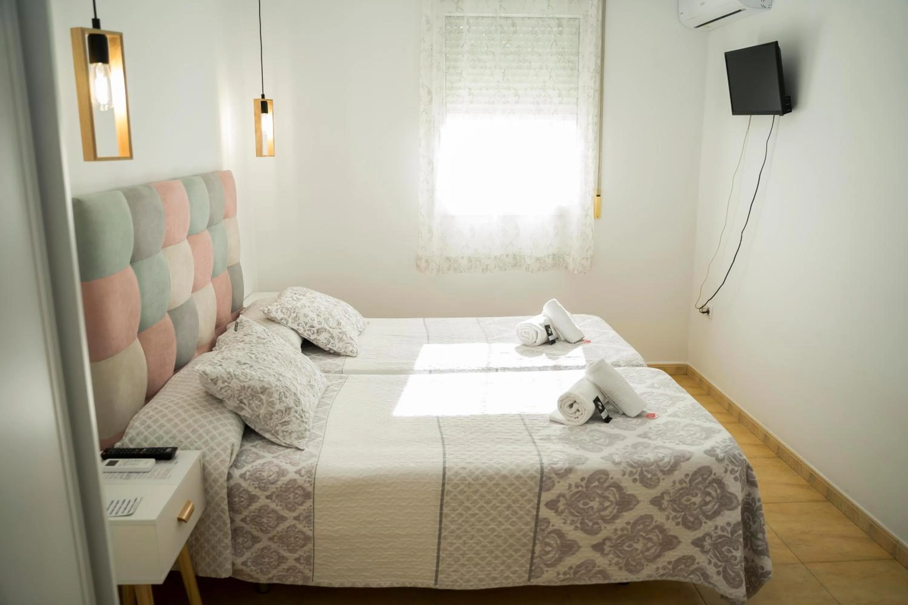 Bed in Hostal Goyesco Plaza