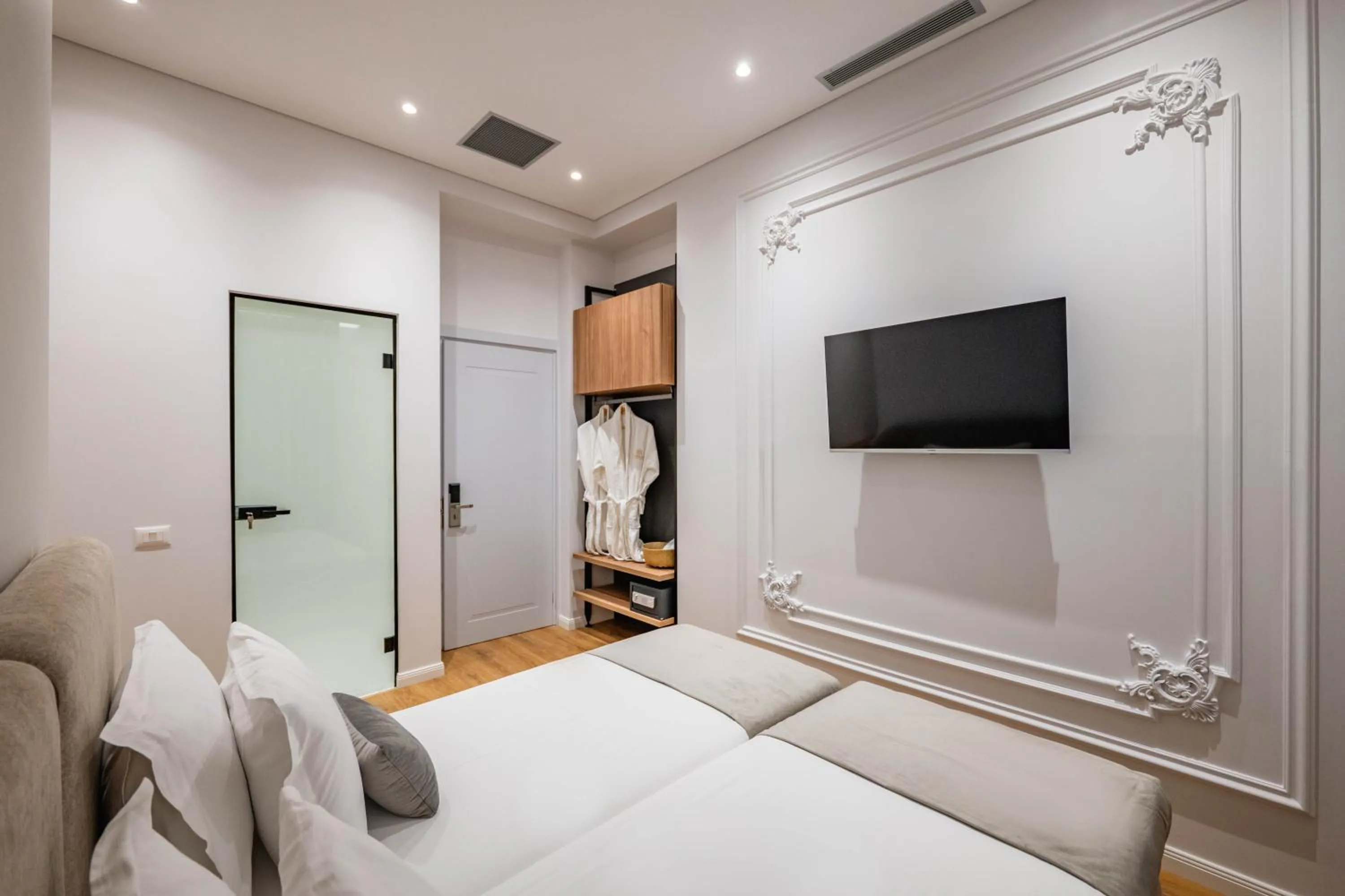 Communal lounge/ TV room, Bed in Mae Select Hotel