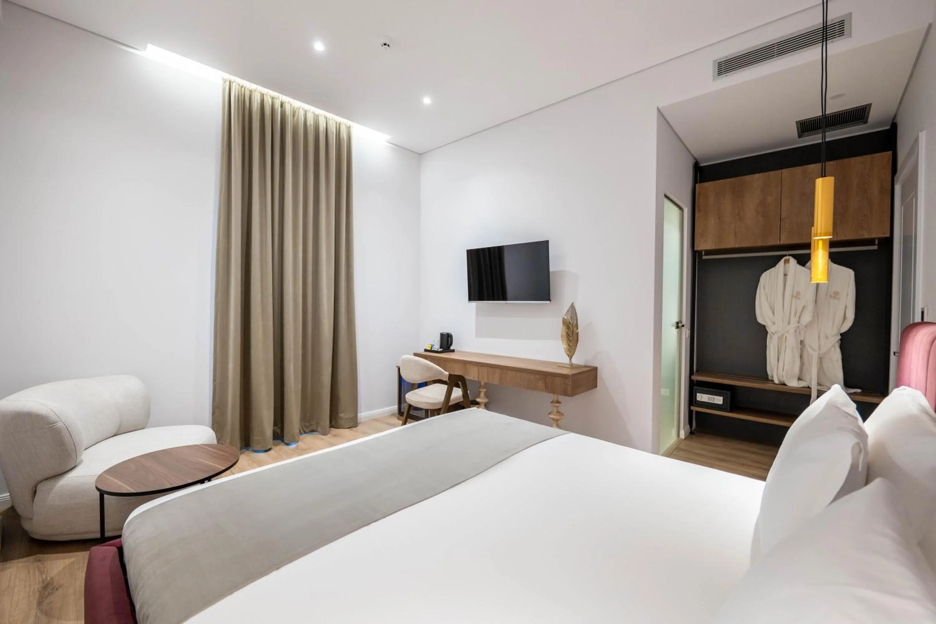 Bed in Mae Select Hotel