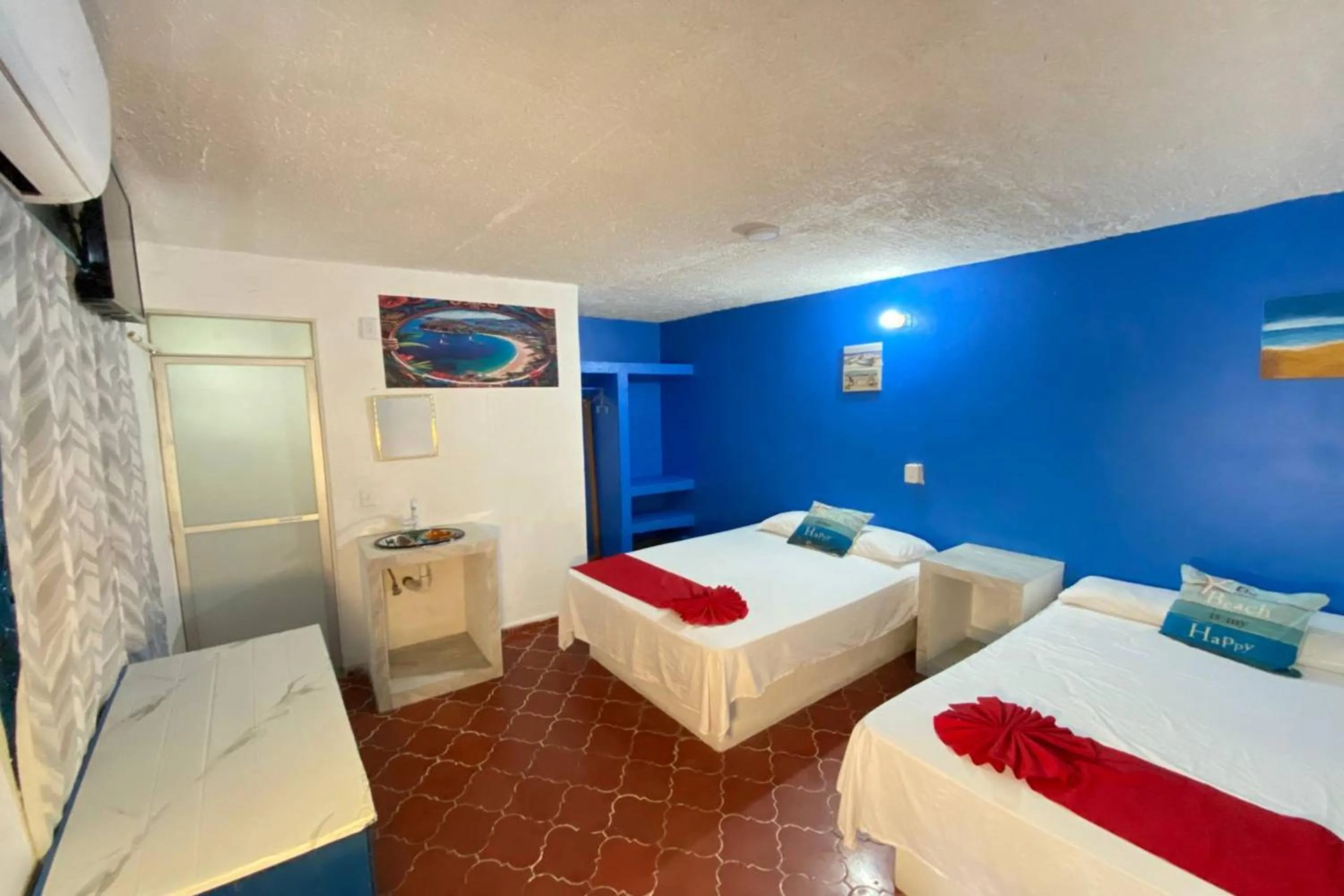 Bedroom, Bed in OYO Hotel Zihuatanejo Malibu