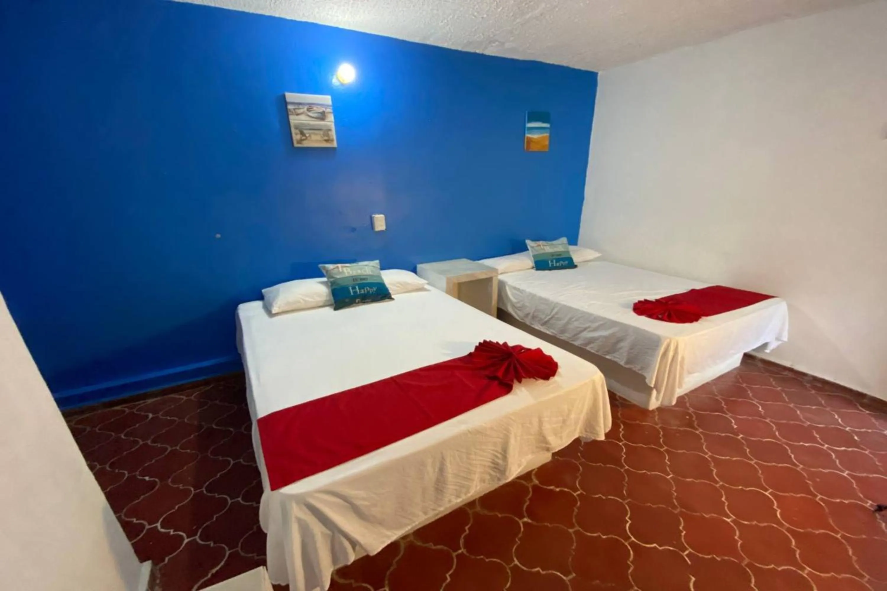 Bedroom, Bed in OYO Hotel Zihuatanejo Malibu