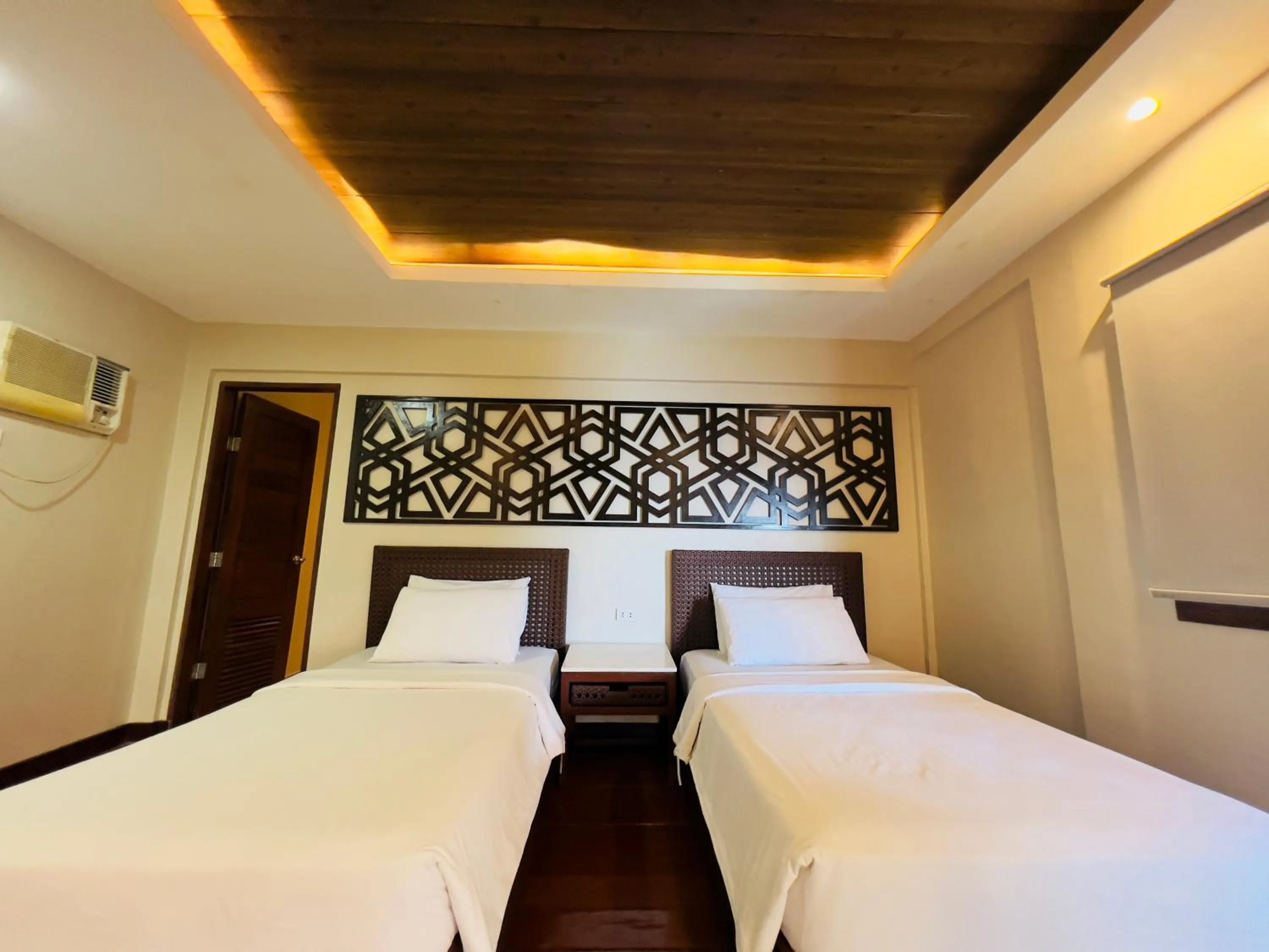 Bed in Alam Indah Beach Resort Busuanga