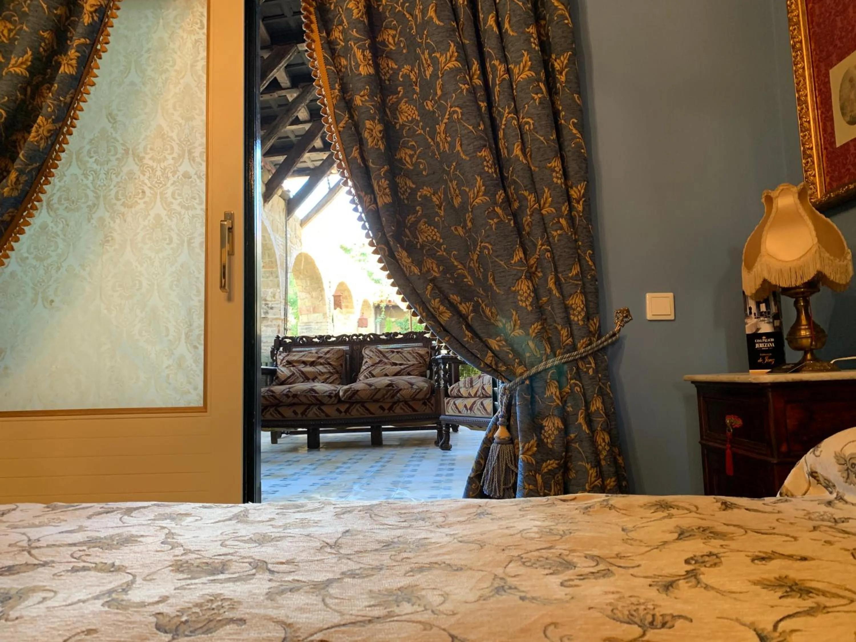 Inner courtyard view, Bed in Casa Palacio Jerezana