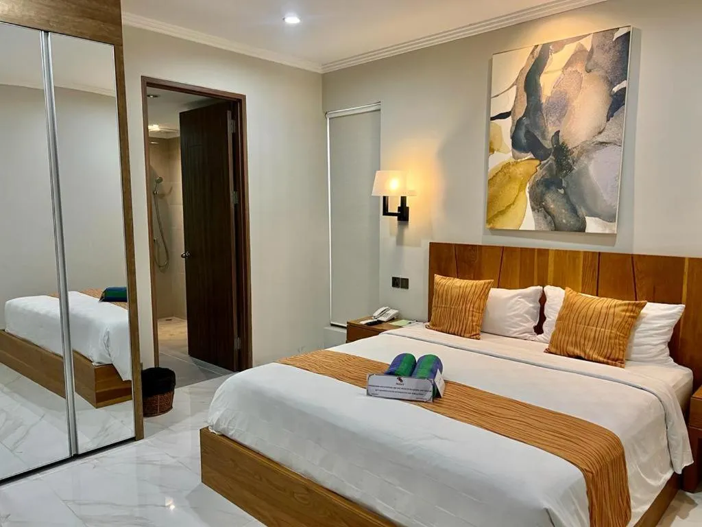 Bed in Peninsula Bay Resort