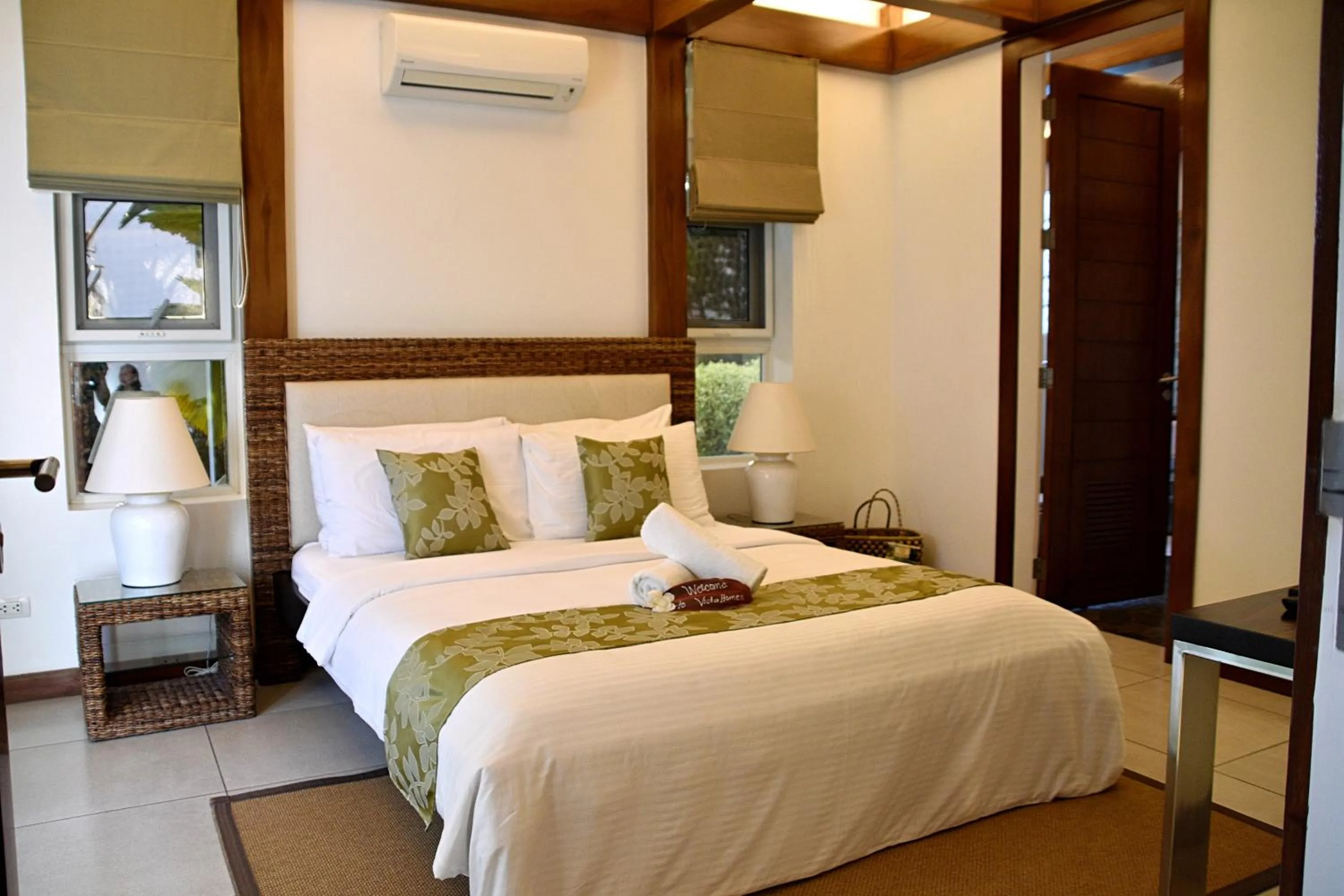 Bed in Vida Homes Condo Resort