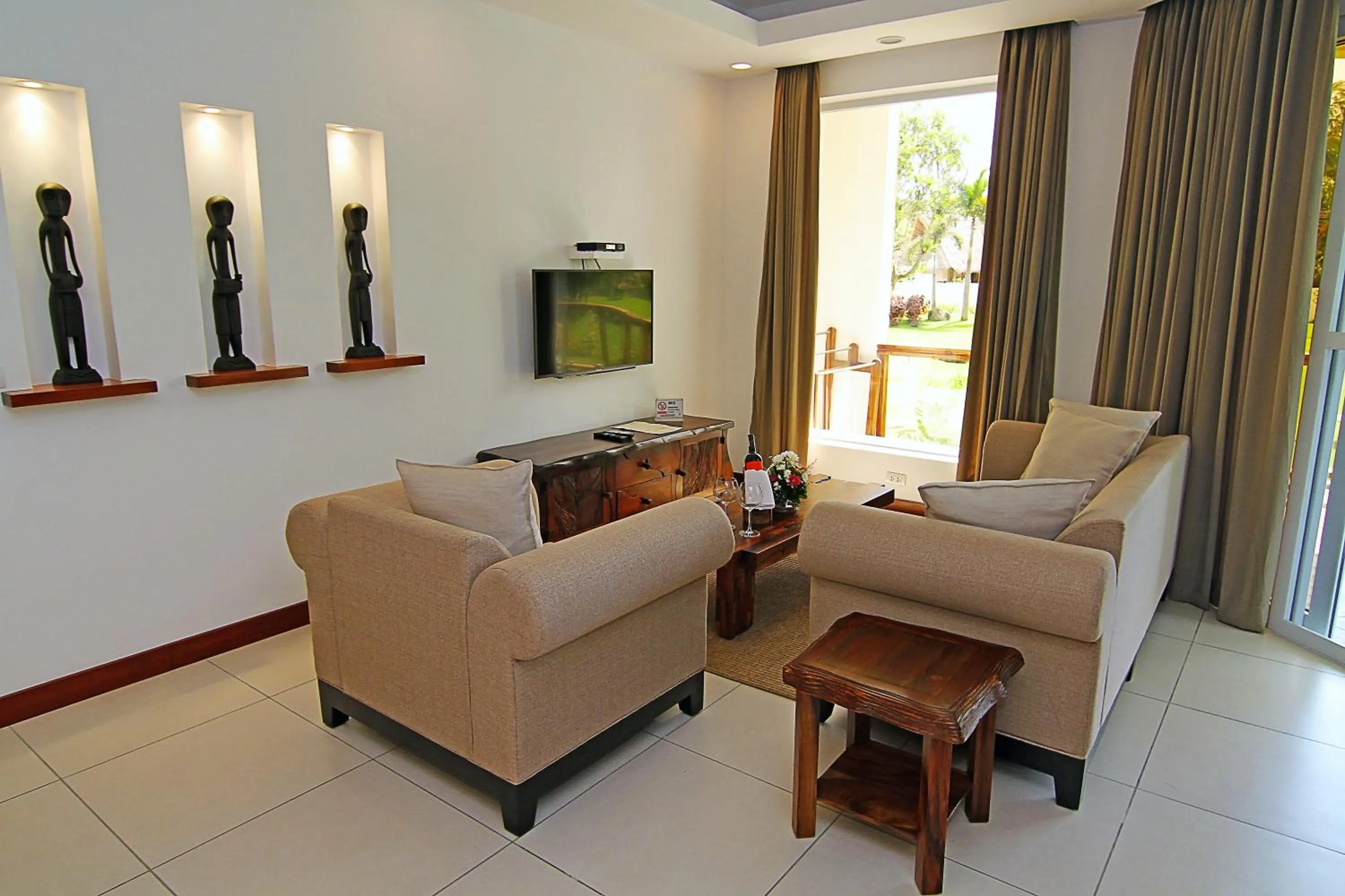 TV and multimedia in Vida Homes Condo Resort