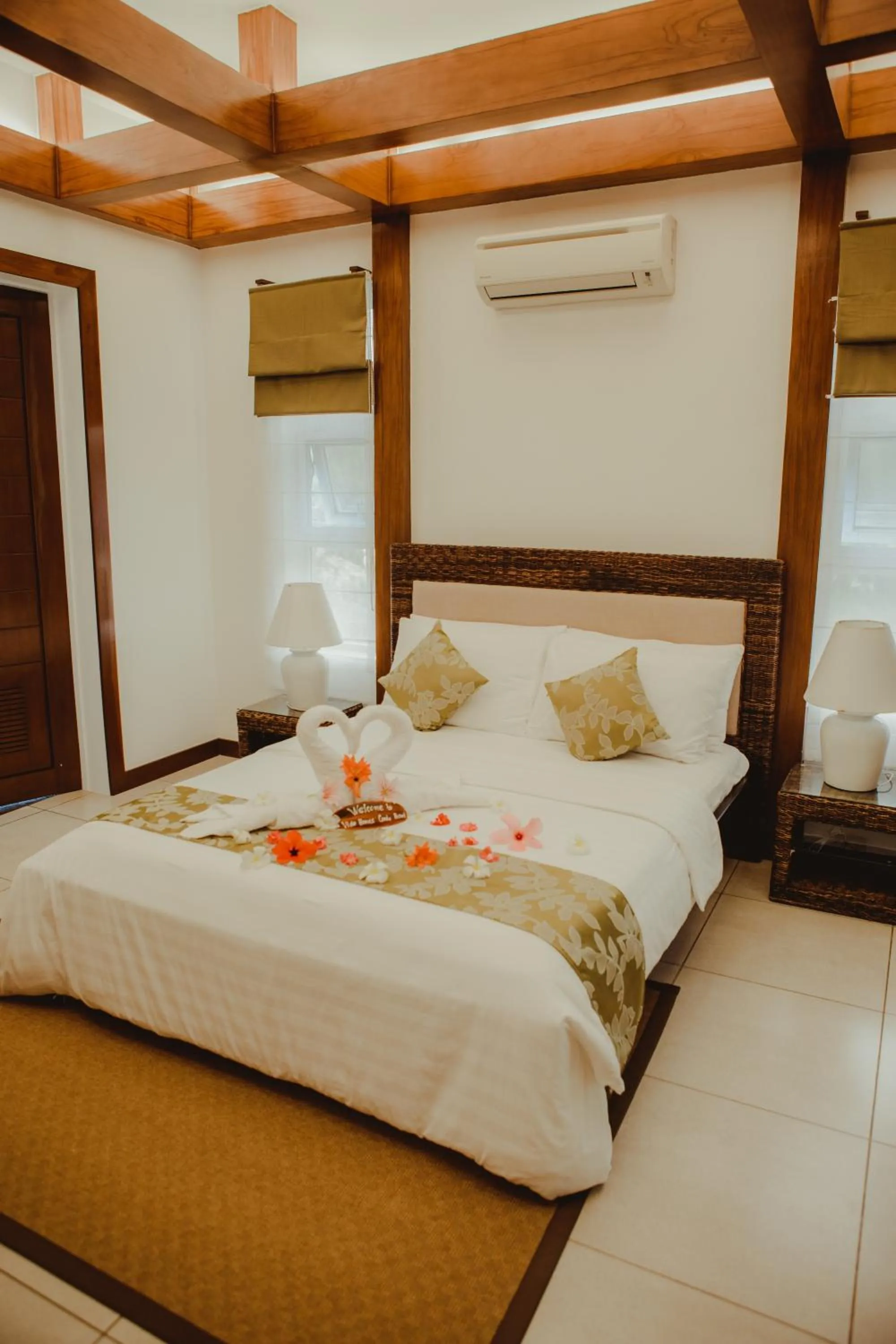 Bed in Vida Homes Condo Resort