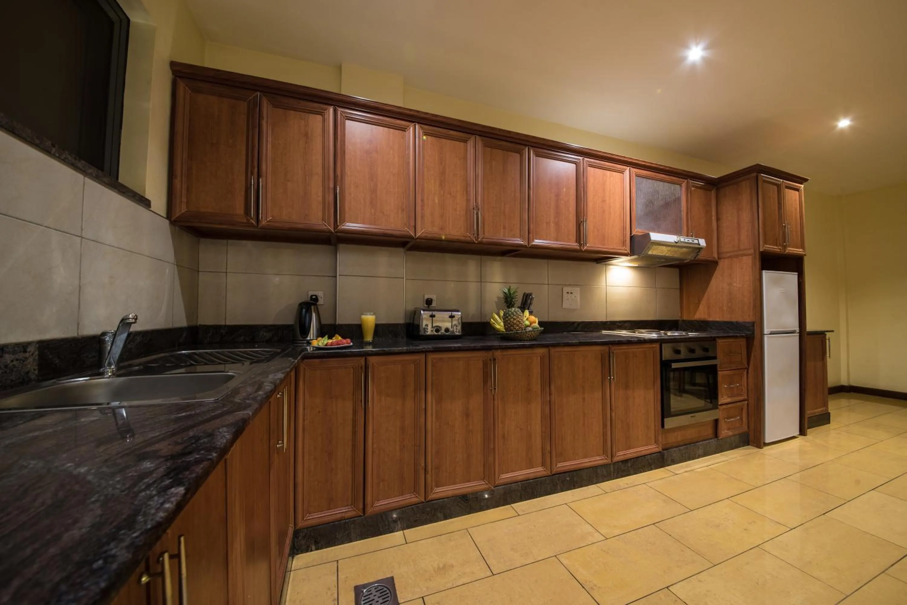 Kitchen or kitchenette in Bukoto Heights Apartments