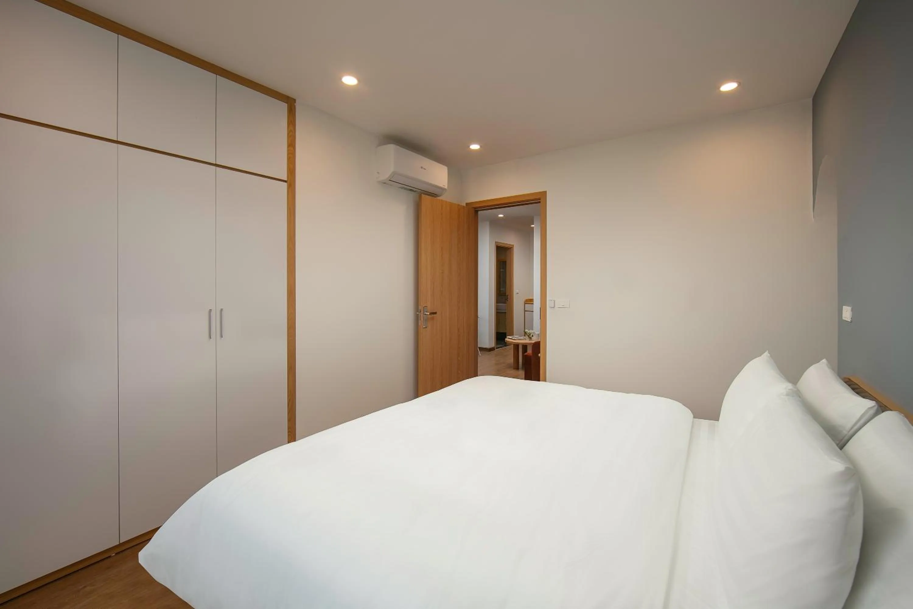 Bed in Westlake Pearl Apartment - Hotel & Pearl Spa