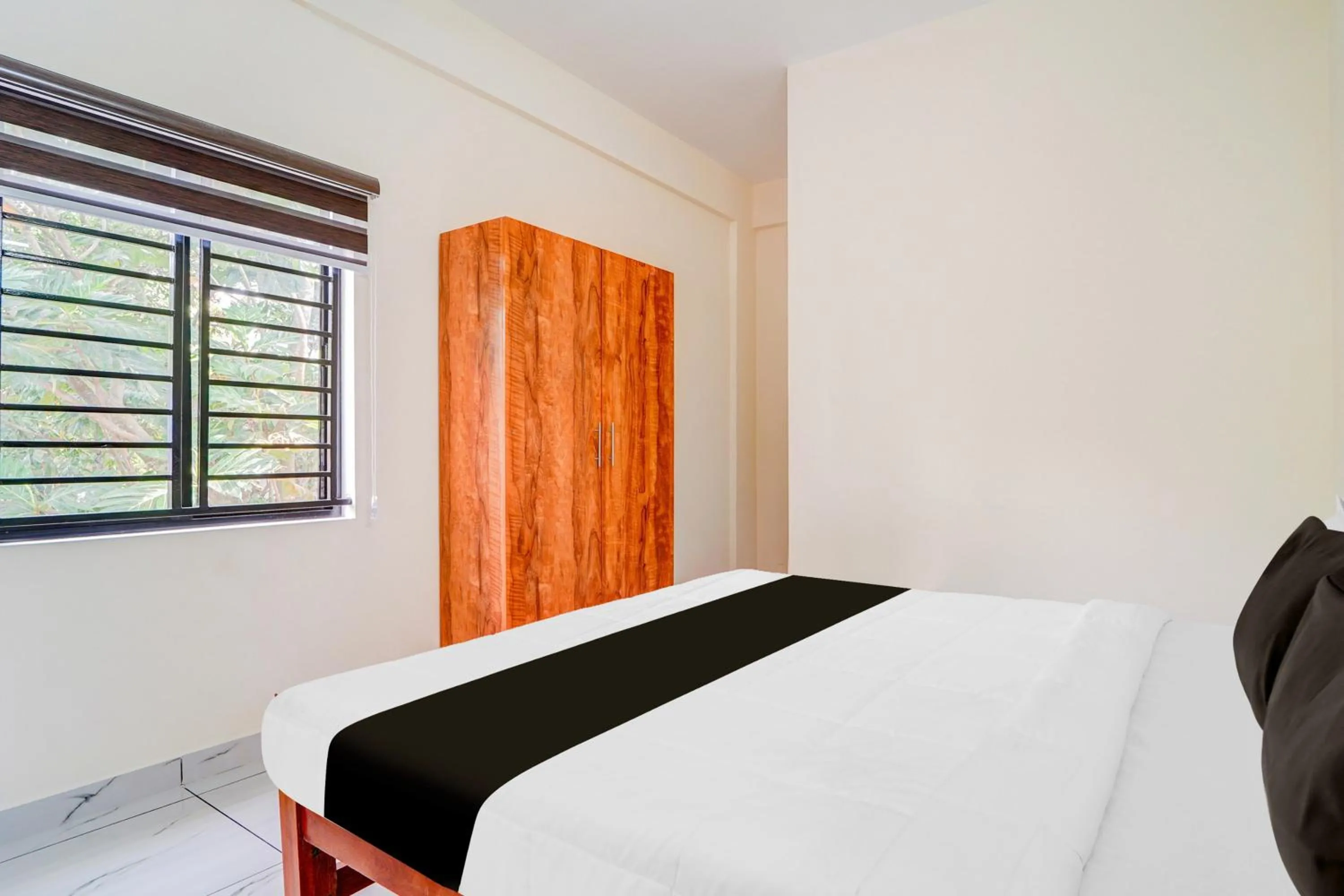 Standard Double Room - single occupancy in Super Hotel O HMT Colony Kochi Formerly Pullans Arcade
