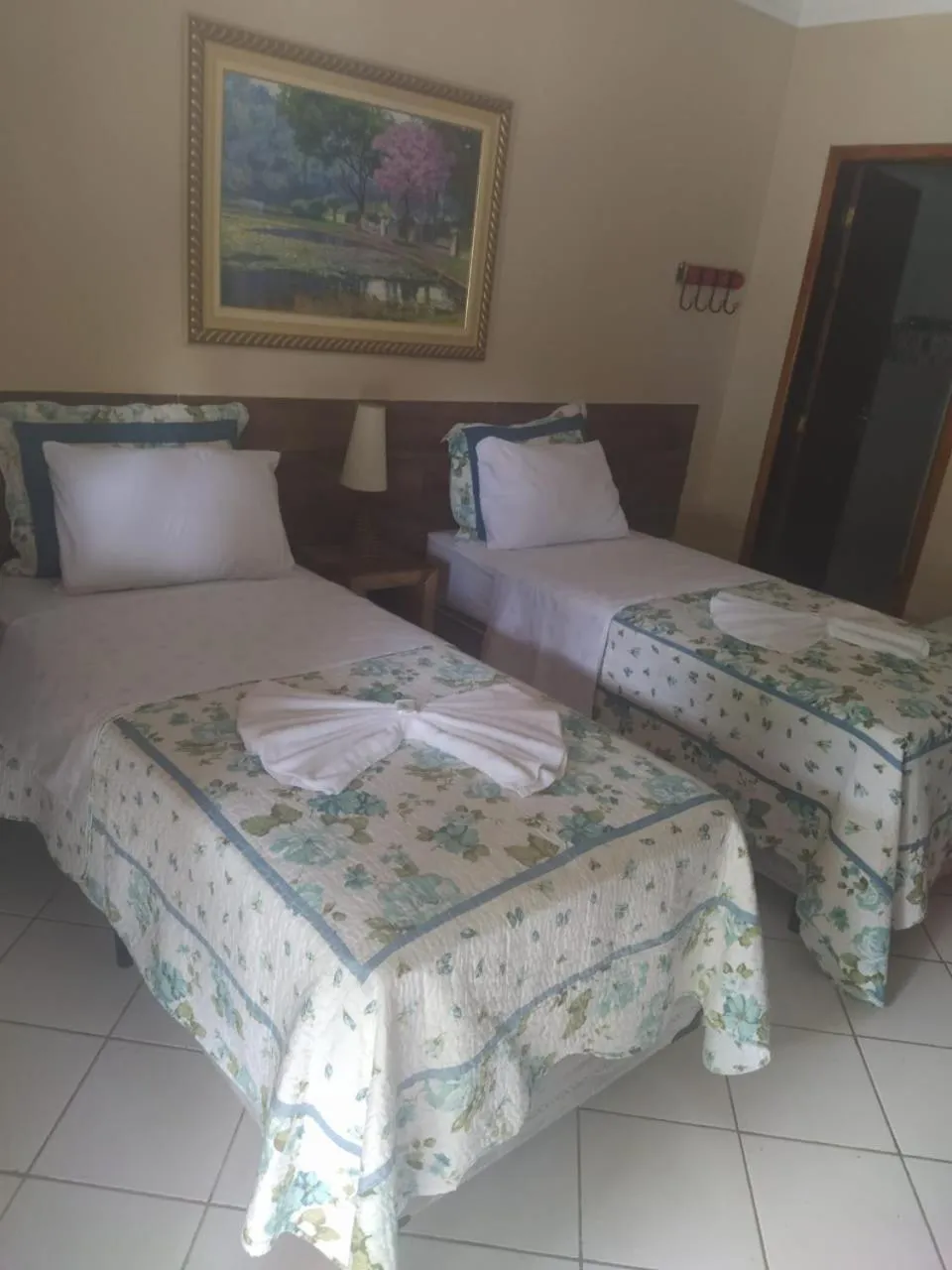 Bed in Pousada Casa do Bosque