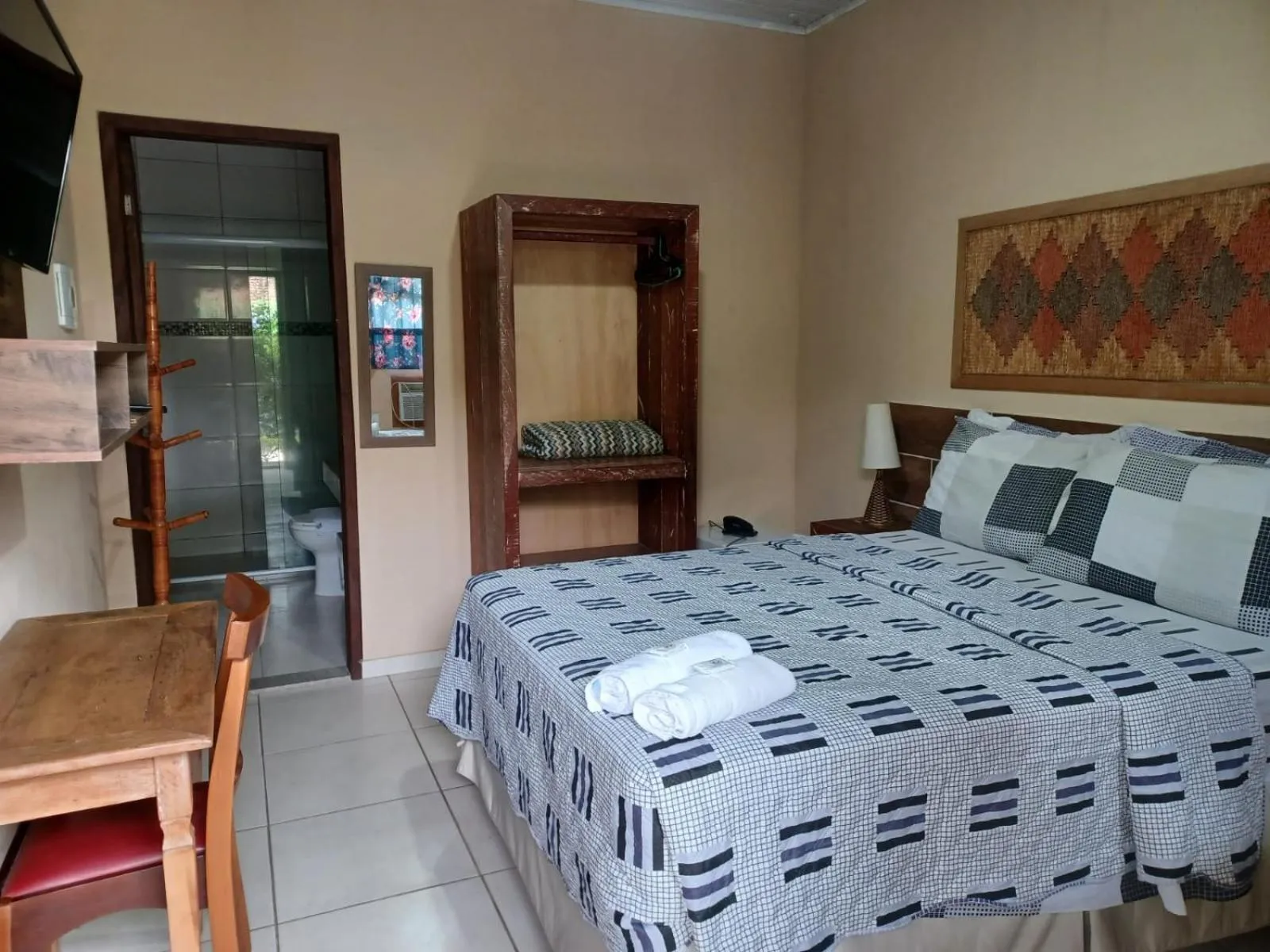 Bed in Pousada Casa do Bosque