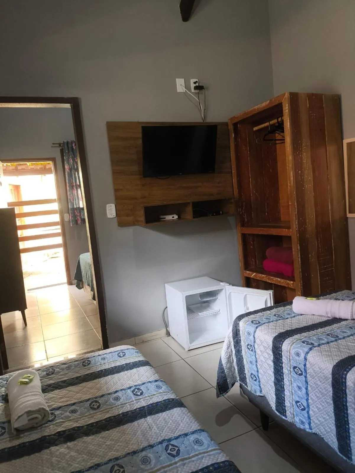 Bed in Pousada Casa do Bosque