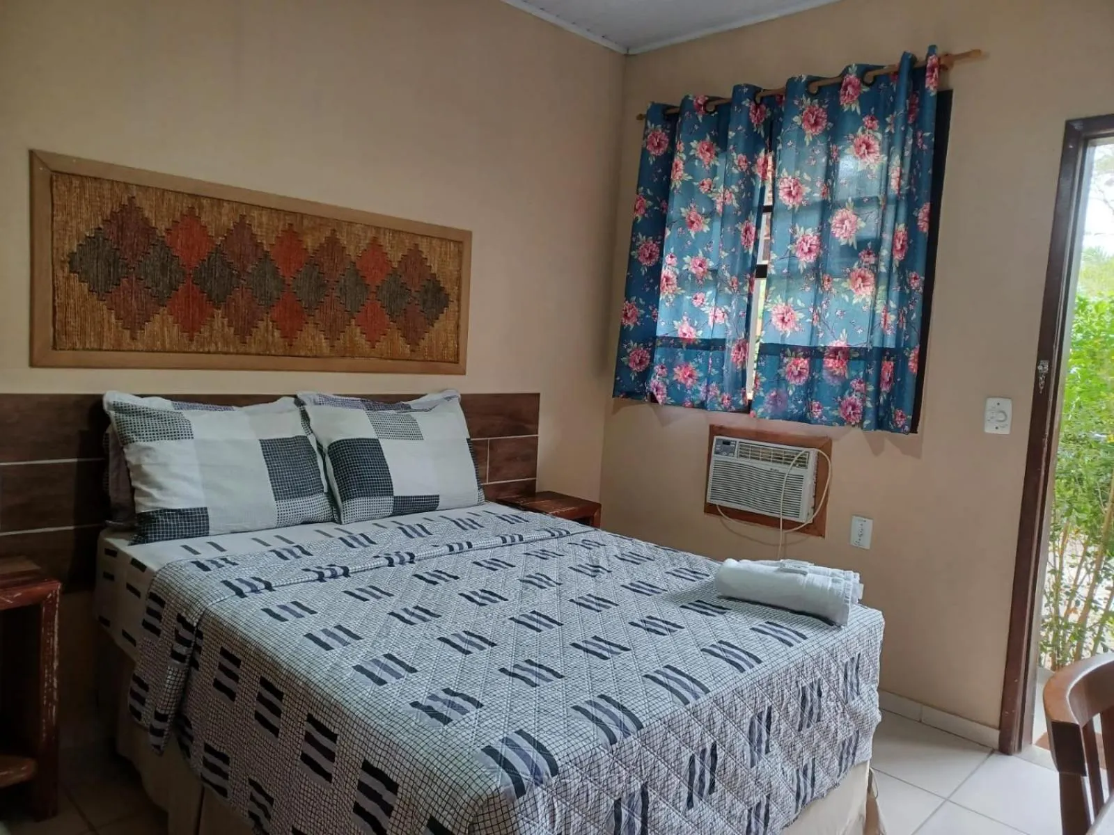 Bed in Pousada Casa do Bosque