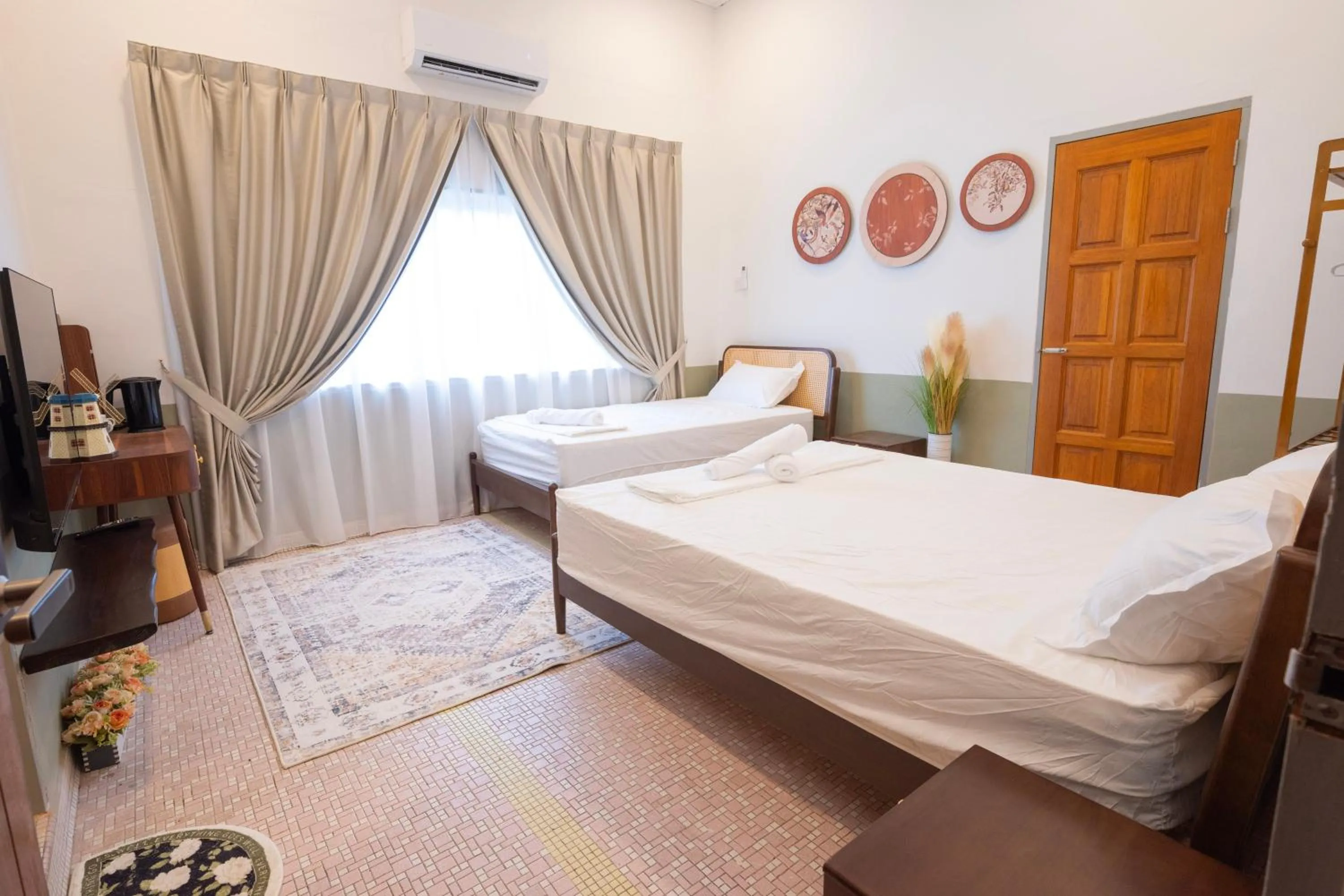 Bed in Big Mansion at Kuantan by Iconique Espace