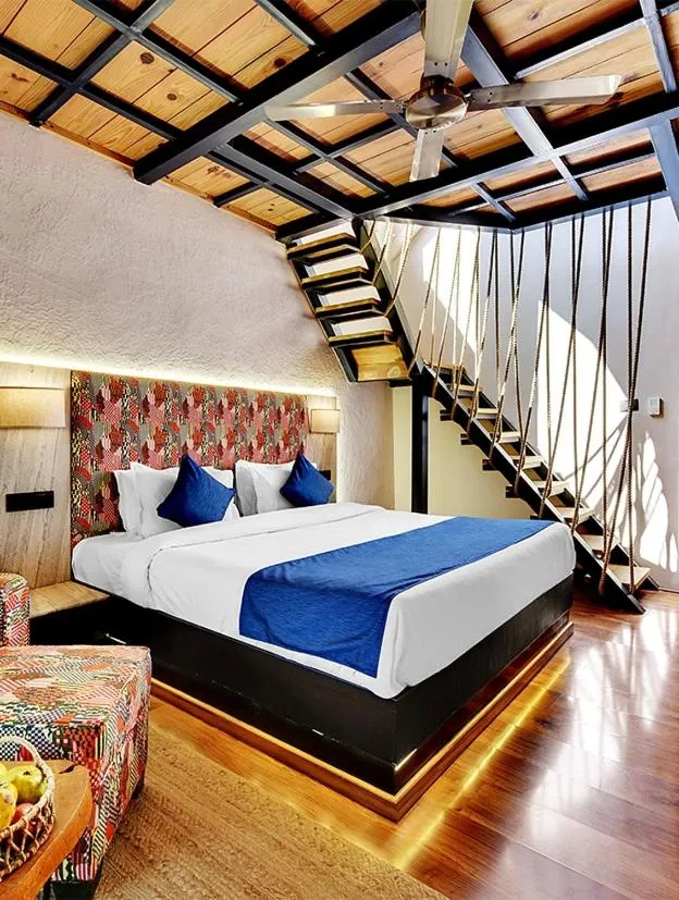 Bed in Tiaraa Jujurana Resort & Spa