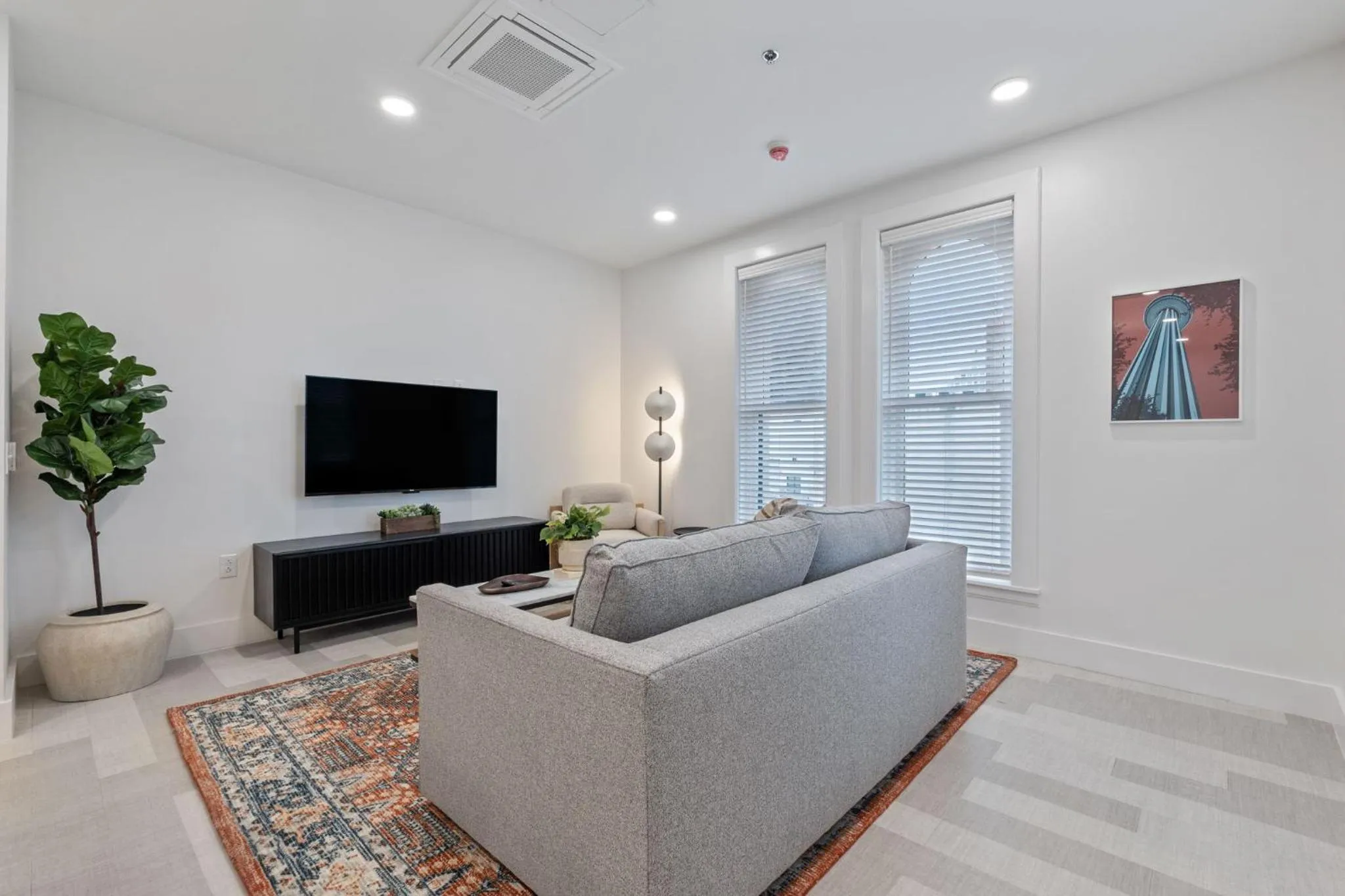 Living room in The Continental, powered by Placemakr - Downtown - Market Square