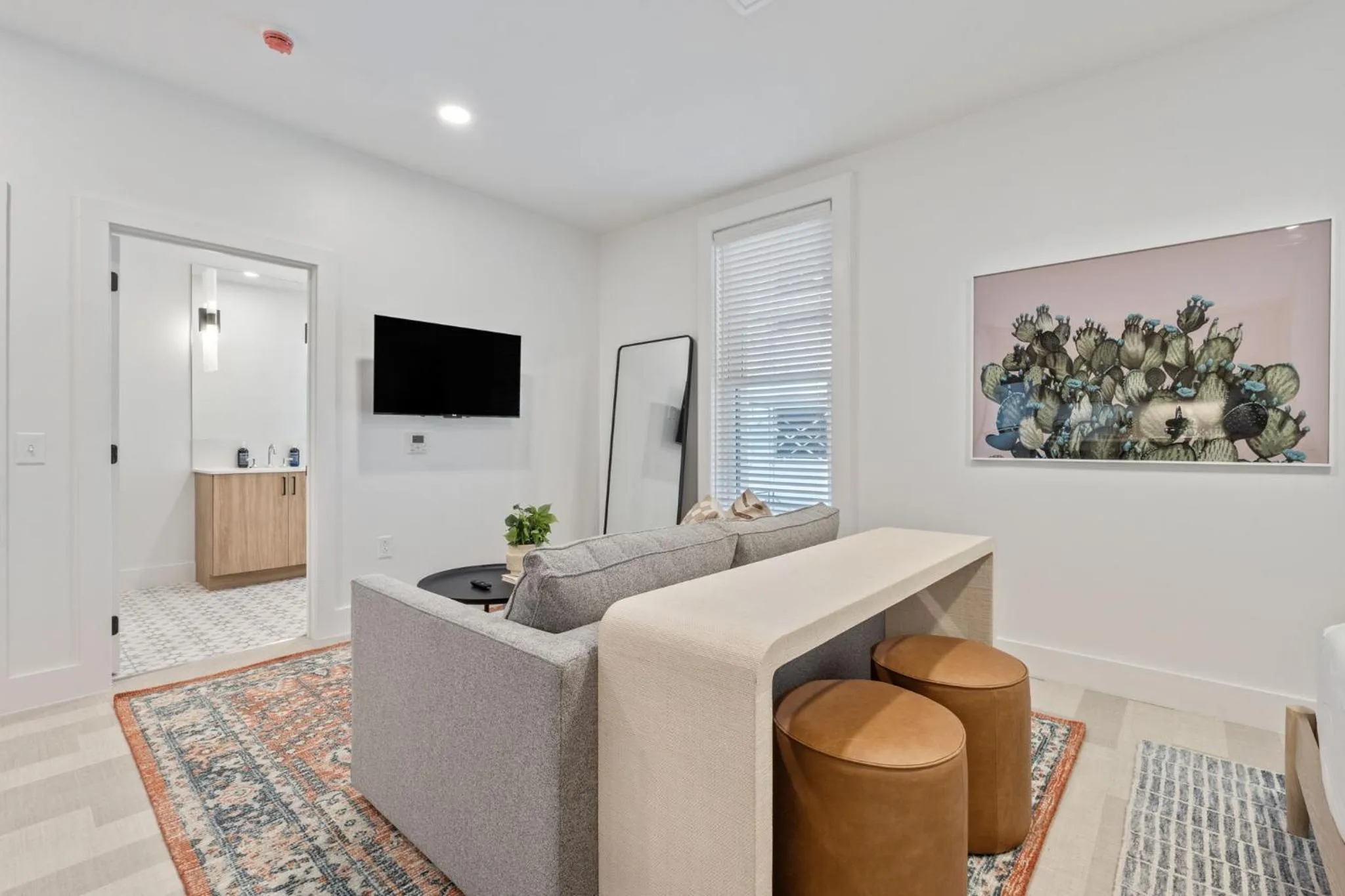 Living room in The Continental, powered by Placemakr - Downtown - Market Square