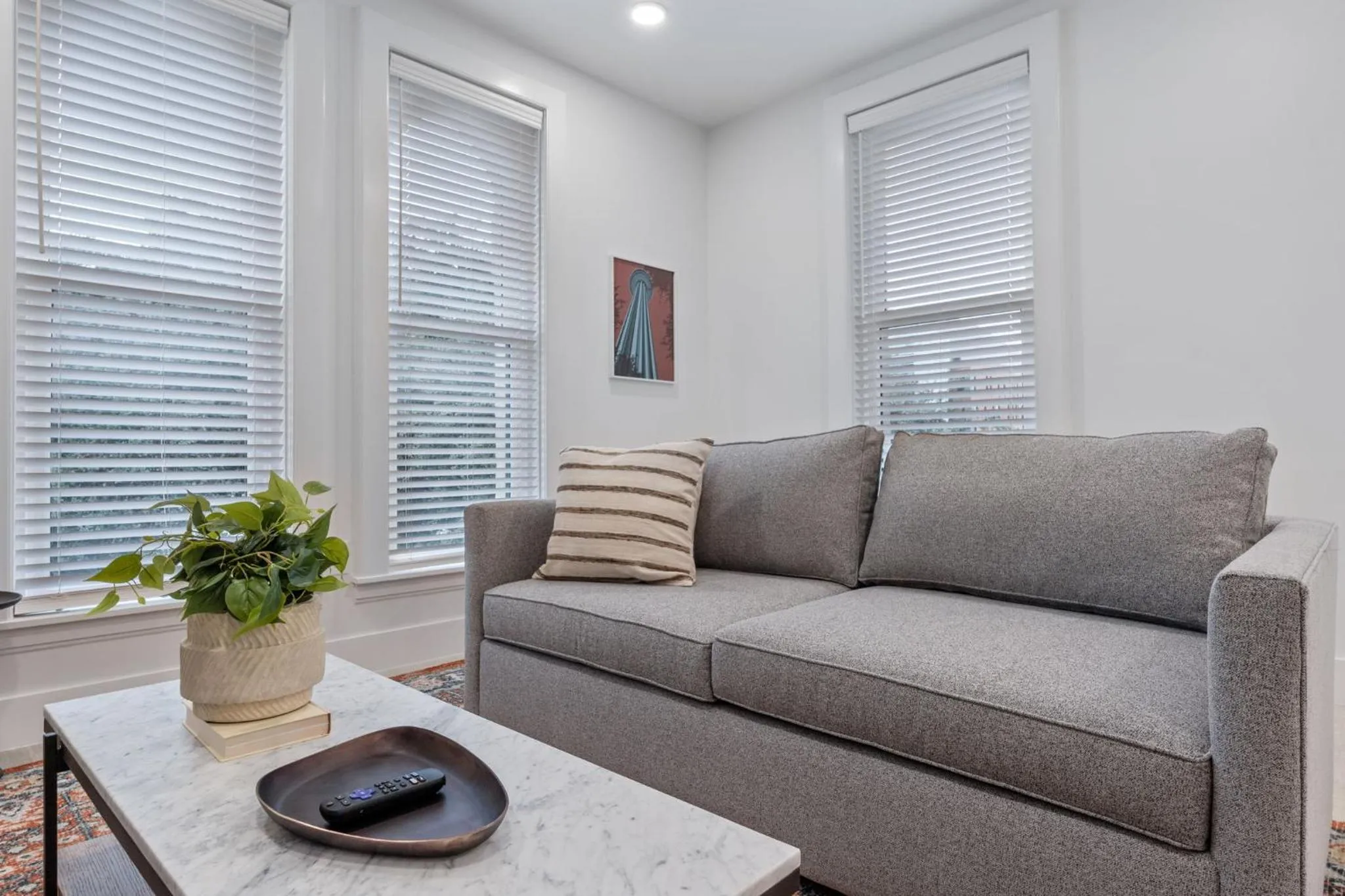 Living room in The Continental, powered by Placemakr - Downtown - Market Square