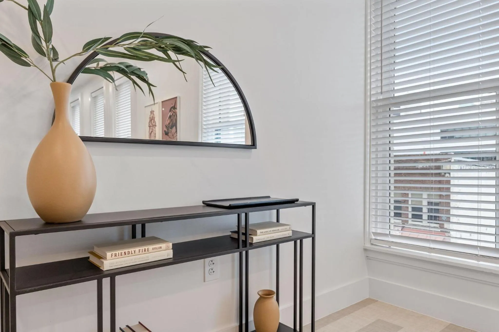 Living room in The Continental, powered by Placemakr - Downtown - Market Square