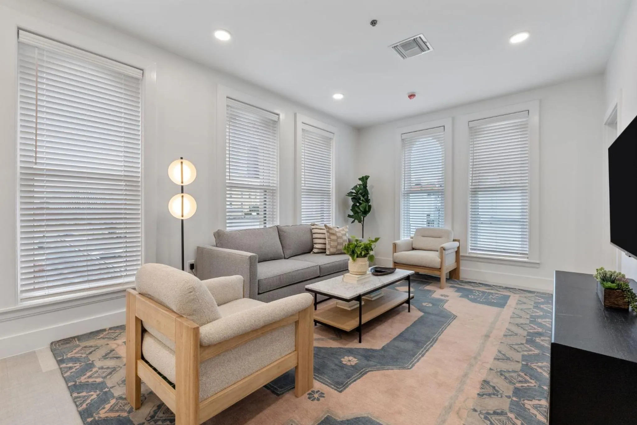 Living room in The Continental, powered by Placemakr - Downtown - Market Square