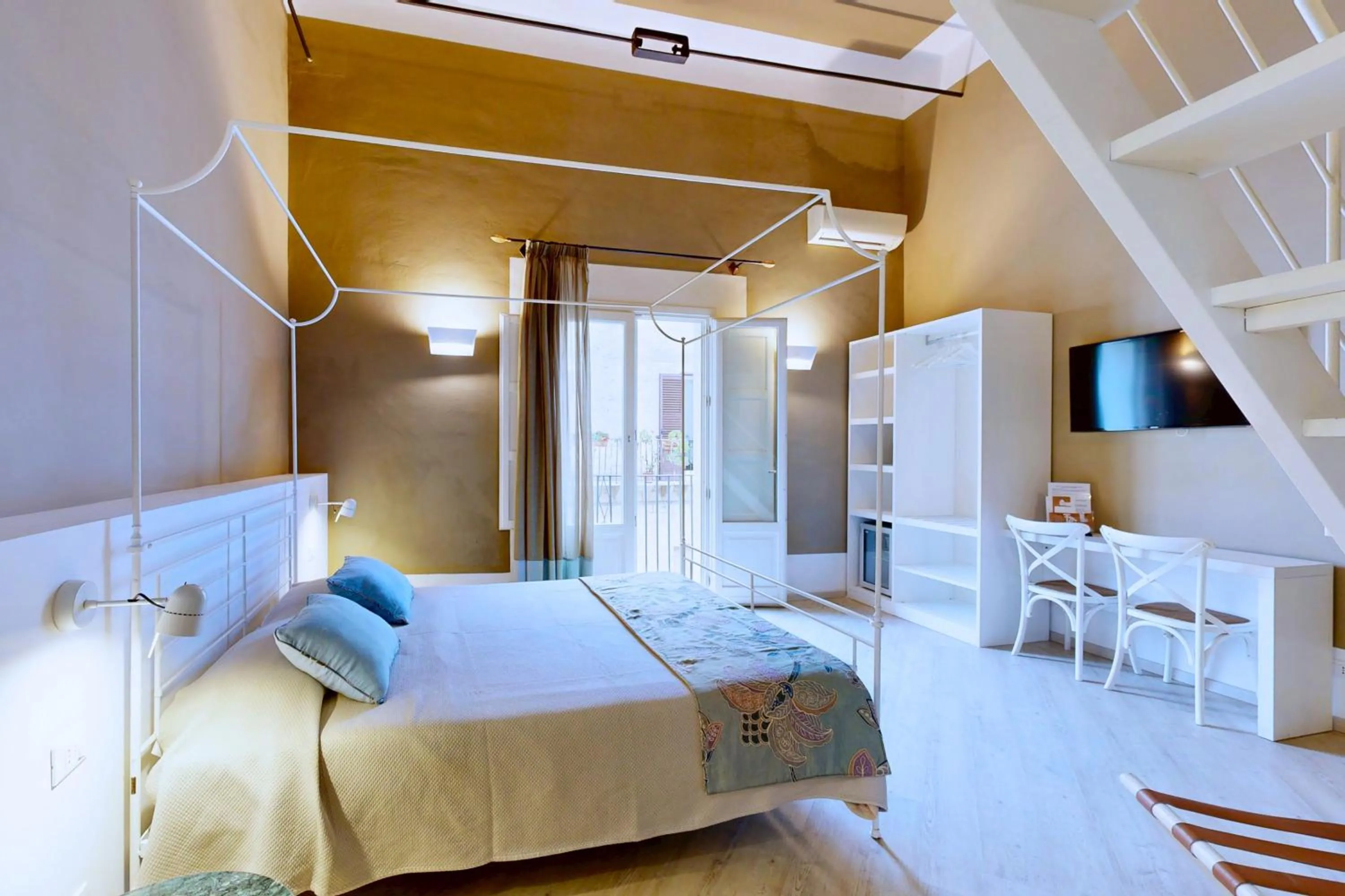 TV and multimedia, Bed in Aegusa Hotel